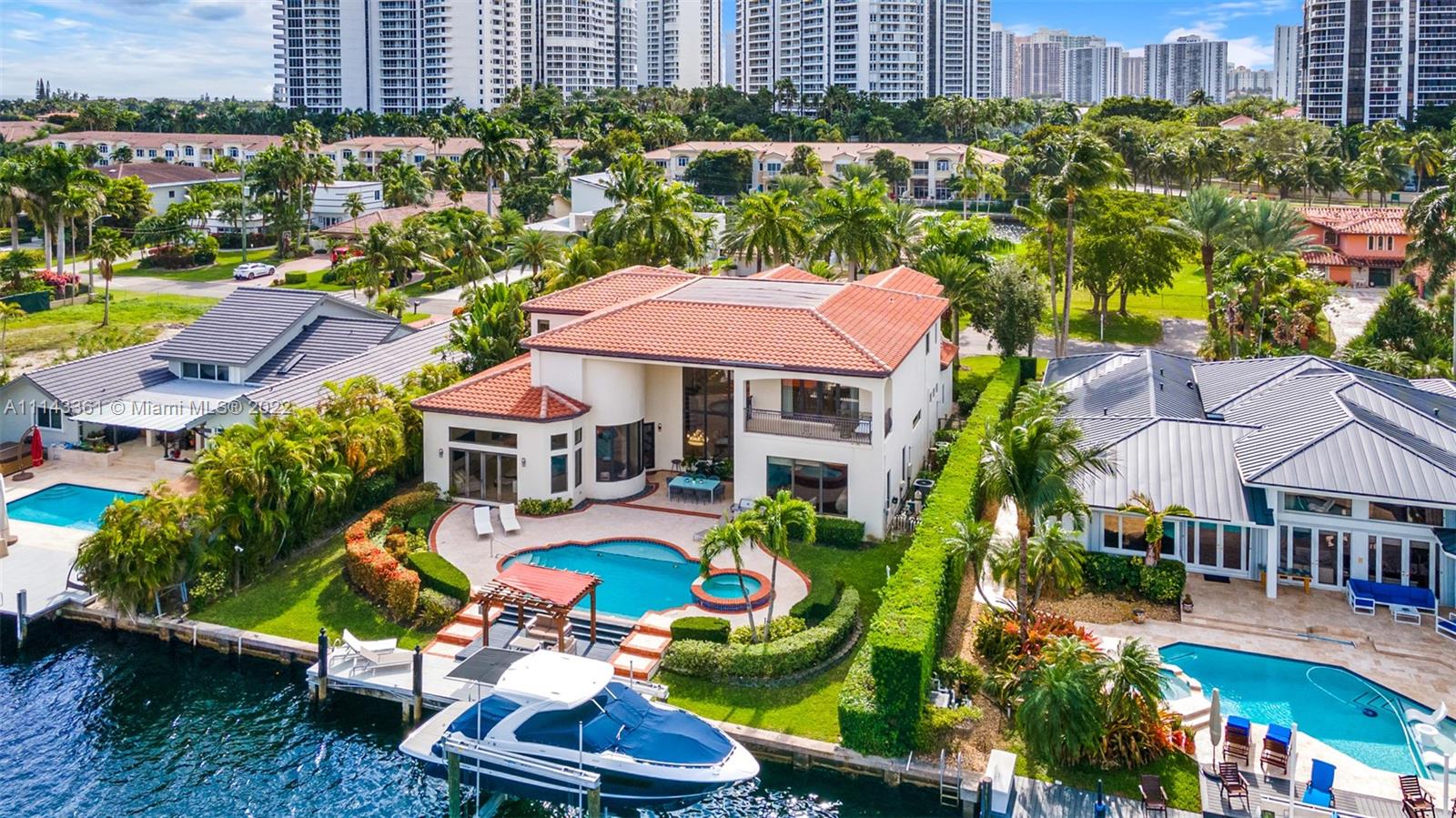 Golden Isles waterfront home built 2008 and in original condition with northern exposure.  Beautiful water views immediately upon entry with a dramatic living room and volume ceilings. This 6BR/6.5BA home has two master suites and has a large fully equipped entertainer’s kitchen. Large backyard with covered terrace ideal for Alfresco dining and heated pool/spa invite you to fully soak in the South Florida lifestyle. Ocean access and no fixed bridges make it ideal for the boating enthusiast. Circular driveway and 2-car garage. Centrally located between Miami and Fort Lauderdale and close to shops, restaurants, beaches and more. Seller is selling this home in "As-Is" condition with no credits at closing for anything.