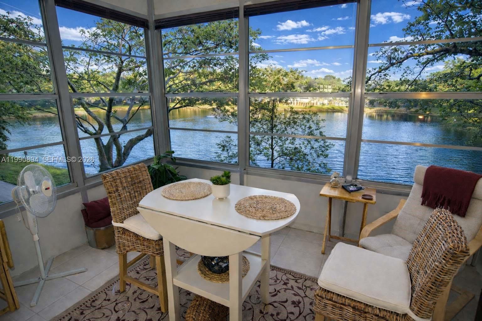 Amazing lake views from every room. This tastefully renovated, fully furnished 2nd-floor condo features a spacious layout, a modern kitchen, a comfortable living area, and ample natural light. Located in a well-maintained community, this unit offers convenience, privacy, and easy access to nearby amenities. Move-in ready and ideal for comfortable living. features white kitchen cabinets, stainless steel appliances, white tile floors, and stylish wood accent walls. The enclosed balcony adds extra living space under the air, perfect for relaxing and enjoying the view. Located in a quiet and well maintained 55+ condo community, centrally located to everything. Just minutes from the Turnpike and about 10 minutes to I-95, with easy access to restaurants, shopping, and daily conveniences. Residents enjoy an active lifestyle with great amenities including a heated swimming pool open year round, gym, shuffleboard, dance classes, and an active clubhouse. Take a peaceful walk along the beautiful trails and enjoy views of the lake and gardens, or spend time by the pool and barbecue area. Association requirements: Minimum 670 credit score required for approval. No pets allowed.
