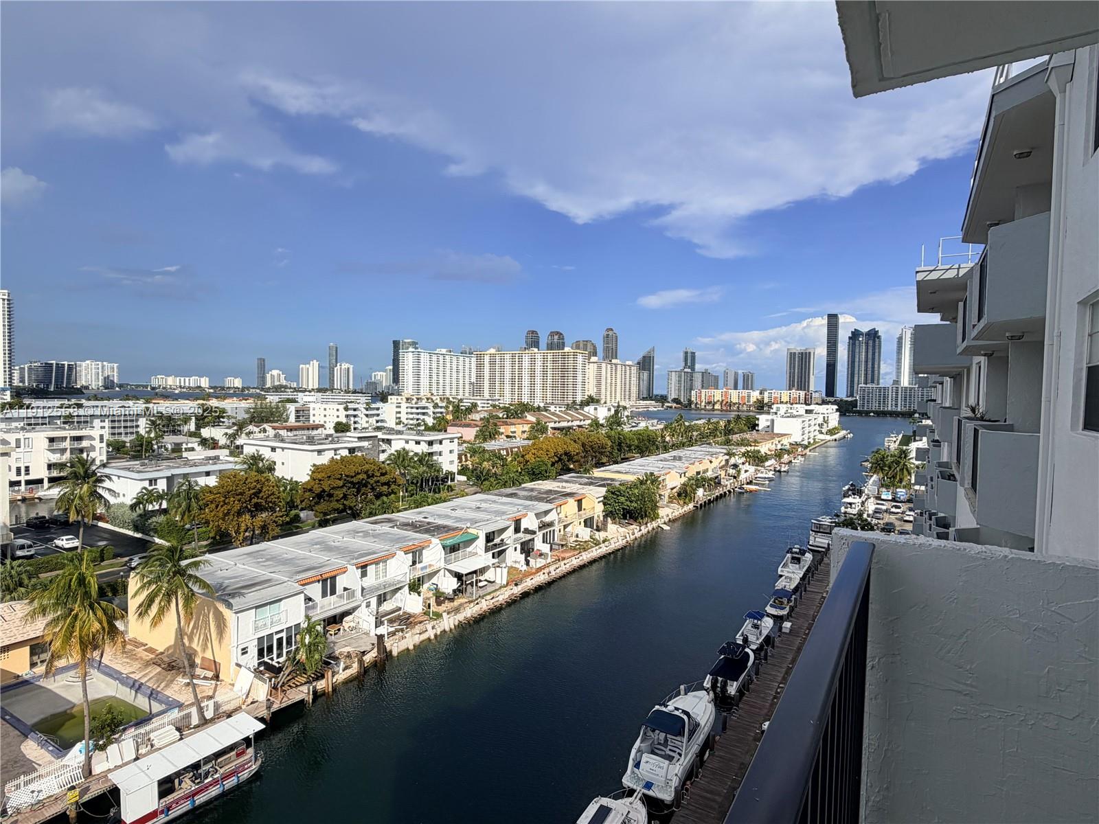 Incredibly rare 1450 sf Corner 3BD/2BA apartment. Stunning panoramic views. Balcony access from every room including kitchen. Recently replaced AC.  Minutes away from Beaches, Sunny Isles, Aventura and Bal Harbour Malls, Restaurants, Oleta River State Park, and so much more. Heated community pool and clubhouse! 1 covered assigned, but plenty of guest parking! Building certification recently completed. The community is gated located in Eastern Shore. Pet friendly.