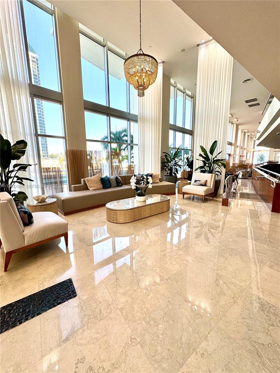 Spectacular oceanfront residence on the 20th floor, located in Sunny Isles Beach, with breathtaking panoramic views of the Atlantic Ocean and the city skyline.
The unit is being sold fully furnished, ready to be enjoyed as a vacation home or to continue generating excellent income. It is currently operating as an Airbnb with excellent reviews and a proven track record of short-term rentals.
Spacious and bright interiors with a functional layout and floor-to-ceiling windows that maximize natural light and enhance the stunning views. This is an ideal turnkey investment opportunity or a perfect second home in one of South Florida's most desirable oceanfront locations.
Includes assigned parking.
Prime location just steps from the beach, restaurants, and shops.