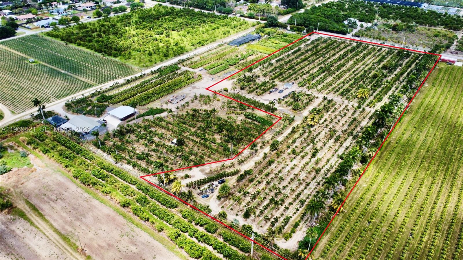 Come build your dream home or farm on this 8.61 acre piece of the Redlands! Currently growing a variety of
Palms, Located in a very desirable area, 450 ft of frontage on to 202 Ave. Close to many shops but just outside the
city! Tree inventory not included in sale, However willing to negotiate.