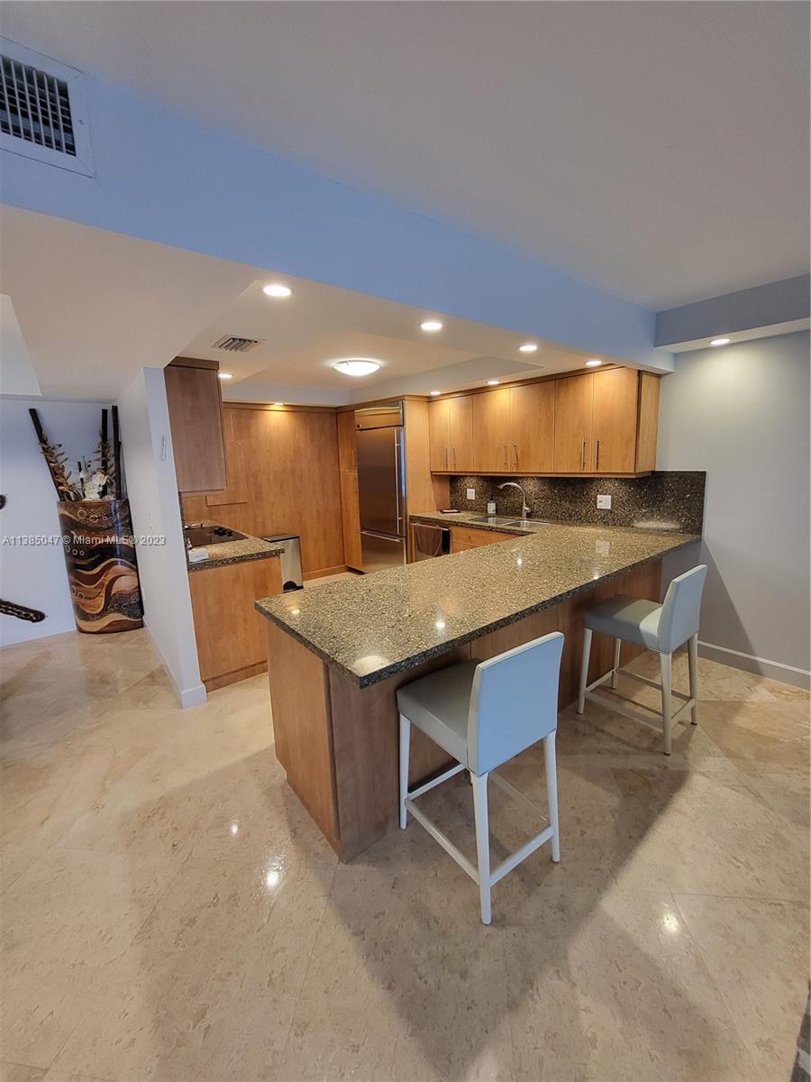 GROVE ISLE CONDO - Residential Lease