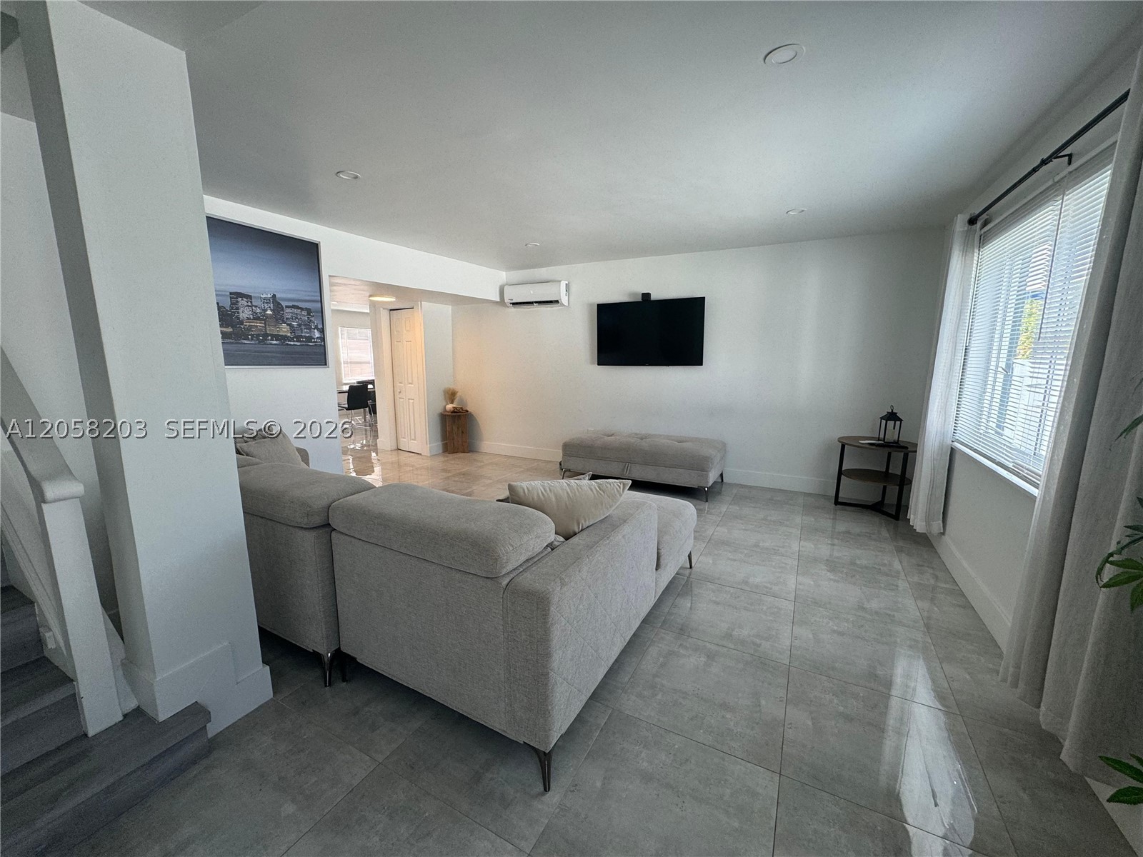 This unique multifamily property offers two separate residences on a spacious corner lot, blending style, comfort, and investment potential. The main home is a fully furnished 3-bedroom, 2-bathroom retreat featuring marble and tile flooring, an open-concept layout, and abundant natural light. Adjacent to it is a private 2-bedroom, 1-bathroom guest house with its own entrance and utilities—ideal for family, guests, or rental income. Located just 10 minutes from the Hard Rock Hotel & Casino, 12 minutes to Las Olas Boulevard, and only 7 minutes from the airport, this property offers exceptional convenience. Whether you're seeking a refined primary residence or a smart income-generating opportunity this home delivers versatility and modern appeal in one of South Florida’s most desirable areas. Property comes with Three different streams of income full remodel of the guest house and top of the line new turf installed around the yard. New AC systems. Each unit has its own private entrance. There are three private entrances. Seller credit offered for rate buy down at closing.