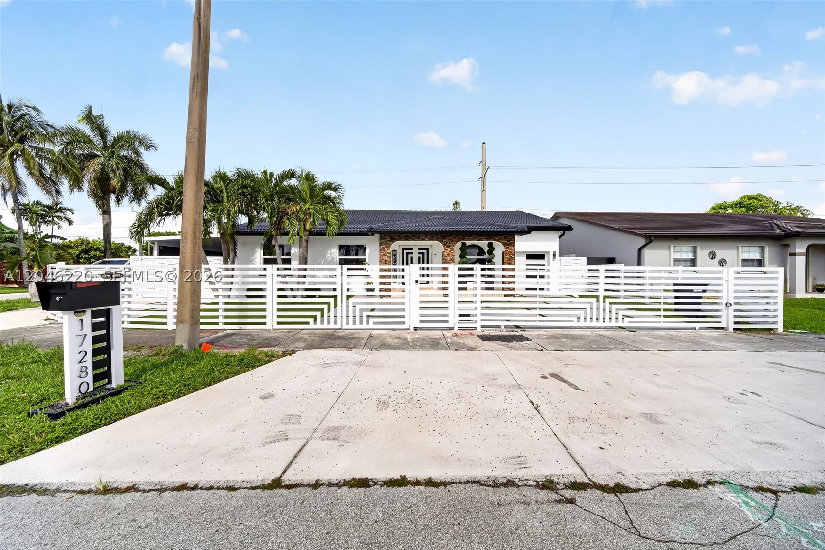 Completely remodeled and move-in ready, this stunning 4-bedroom, 2.5-bath residence offers over 1,800 sq.ft. of beautifully updated living space on an almost 6,000 sq.ft. corner lot. Designed for both comfort and entertaining, the backyard is a true oasis featuring a sparkling pool flanked by a spacious gazebo on one side and a fully equipped outdoor kitchen on the other. A convenient cabana bathroom adds to the resort-style experience. Inside, you'll find modern finishes throughout, impact windows and doors, a tankless water heater, a new fence, a circular driveway, and a one-car garage. This exceptional home seamlessly combines style, functionality, and outdoor living in one incredible package.