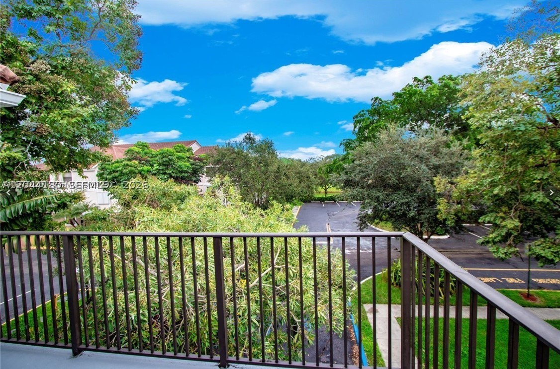 Beautiful corner-unit 1-bedroom, 1-bath residence featuring soaring high ceilings, tile and laminate wood flooring, a spacious walk-in closet, oversized private balcony, and an in-unit washer and dryer. Located in the desirable gated community of Grand Marquis, residents enjoy resort-style amenities including a swimming pool, fitness center, clubhouse, tennis courts, BBQ and picnic areas, and beautifully maintained grounds. Conveniently located near major highways, shopping, dining, and entertainment. Tenant in place until July 30 2026