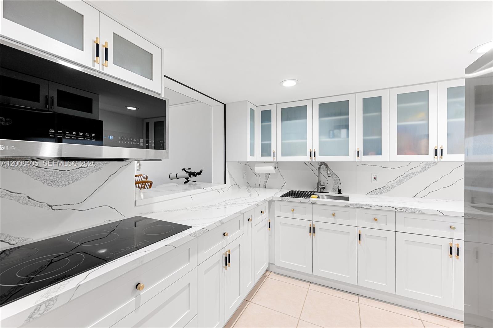 Remodeled 2 Bed 2 Bath unit with a balcony , washer and dryer hook up  in a great complex. Kitchen and kitchen appliances are all less than 2 years old. The unit comes with one assigned parking space but more spaces are available. Unit also includes a small storage closet.