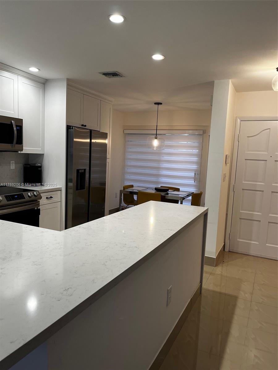 TOWNHOMES OF DORAL PLACE - Residential Lease