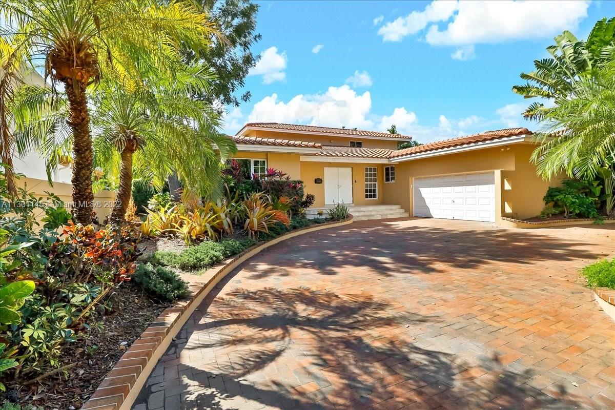 Amazing masterpiece on North Shore Drive, one of Miami's most scenic streets, close to the historic Grove Village and to the Bayfront Parks and marinas. Spectacular European style property with high ceilings and walls of glass overlooking the garden and pool area; large backyard with a potential entertainment area including bar with covered terrace; electric shutters for hurricane protection and front gated; high-end appliances, private master bedroom on second level with luxurious bath and jacuzzi. Bay Heights Community provides 24/7 Police Patrol security in the neighborhood, provided by Miami Dade.