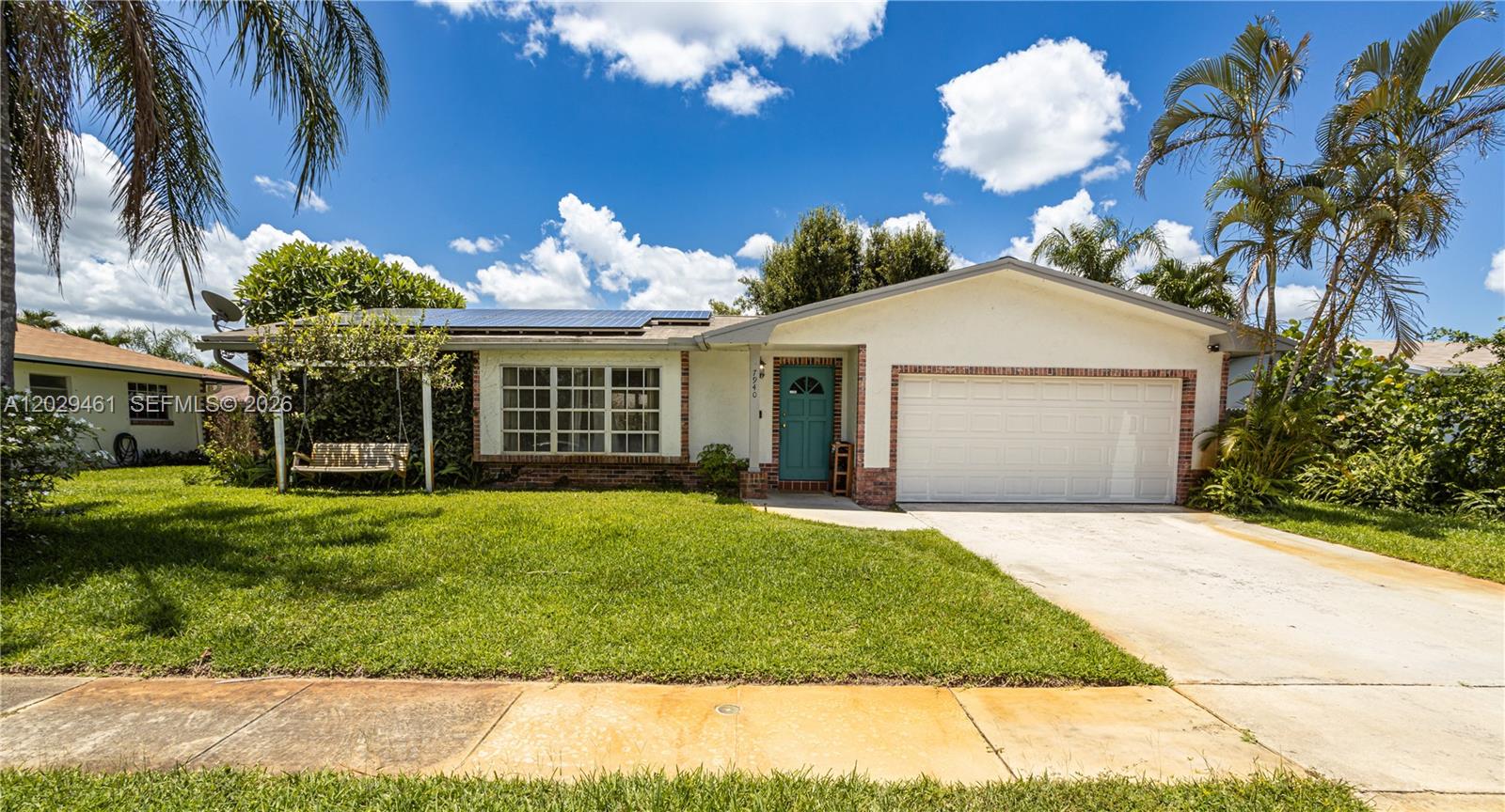 Investor Opportunity! Spacious 4-bedroom, 2-bath home with 2-car garage and no HOA. Features include a large backyard, solar panels, impact-rated garage door, and natural well for sprinklers. Recent updates: flat roof (2025), main roof in permit approval (paid), new washer/dryer, water heater (2023), AC (2021) under warranty, and solar panel system. Property is leased until Oct 2027 at $4,000/month, with a tenant in place since 2023 for immediate rental income. Buyer to verify all information. Seller and agent assume no responsibility for errors or omissions.