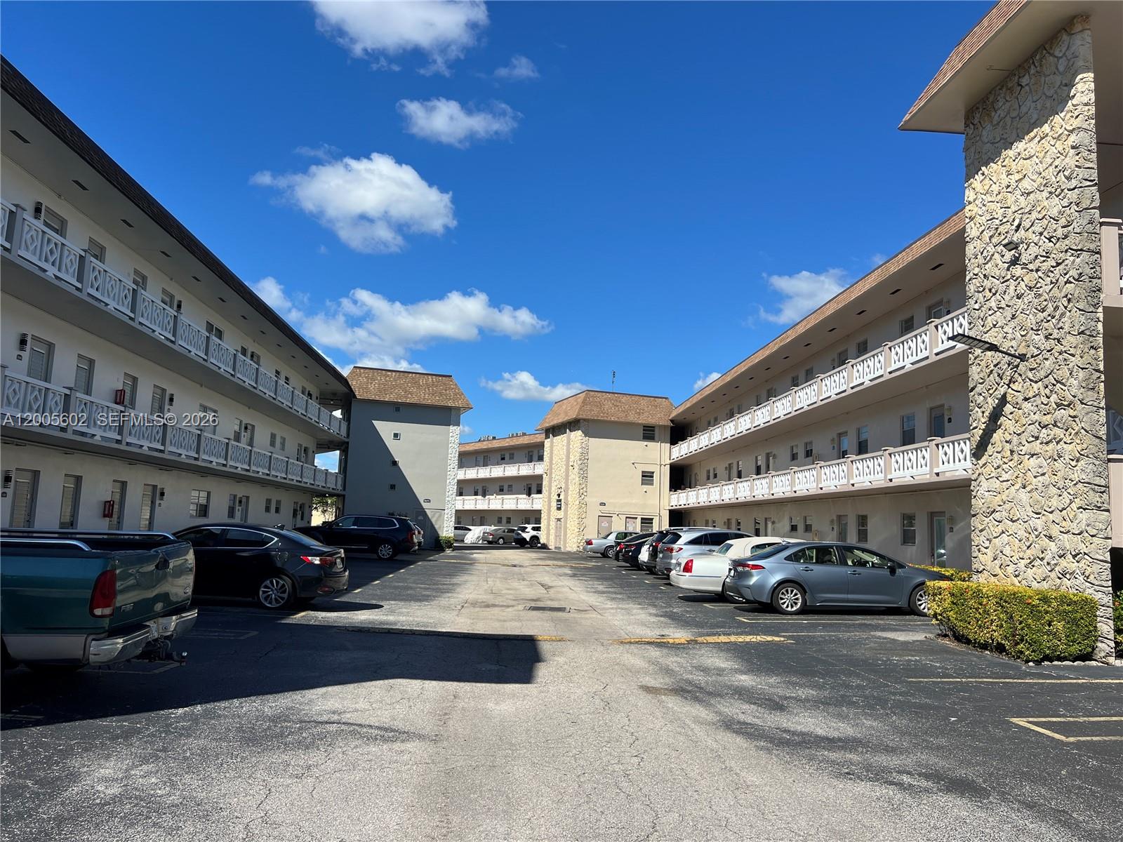 INVESTOR OPPORTUNITY – HIGH RETURN! Spacious 2nd-floor 1 bed, 1 bath condo with elevator access and a large, enclosed balcony that can be used as a den or office. Functional layout with wood cabinetry. Clean and well-maintained unit. Located in the desirable Hawaiian Gardens 55+ community, offering a peaceful and well-kept environment. Currently rented at $1,300/month with a tenant in place—start generating income from day one! Perfect for investors seeking strong returns with ~9% ROI potential. Rent right away with no waiting period (buyer to verify with association). Strong cash flow potential. Enjoy resort-style amenities including pool, gym, picnic/BBQ area, and walking trail. Prime location near Medical Center, Turnpike, malls, Ft. Lauderdale, and only 10 minutes to Sawgrass Mills. Great for investors—don’t miss this opportunity!