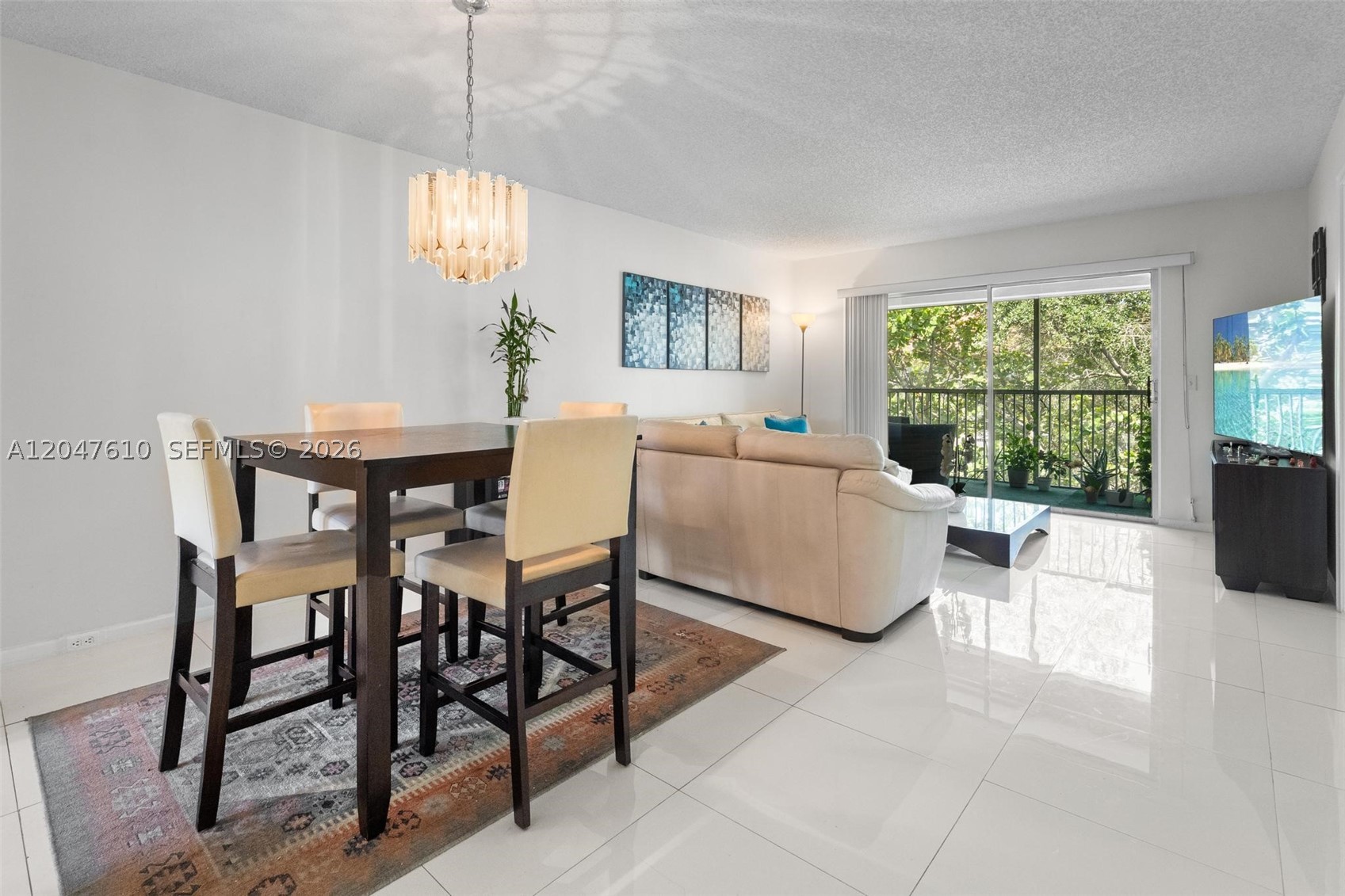 55+ COMMUNITY. Investor opportunity in Cambridge at Century Village Pembroke Pines. Tenant occupied through 04/18/2027 at $2,120 per month, providing immediate rental income subject to the existing lease. This fourth-floor 2-bedroom, 2-bath condominium features a split-bedroom floor plan, in-unit washer and dryer, assigned parking, and a spacious screened balcony overlooking mature trees. Gated community with clubhouse, fitness center, indoor and outdoor pools, tennis, golf, theater, social activities, courtesy transportation, and security. Cable TV and high-speed internet are included in the association fee.