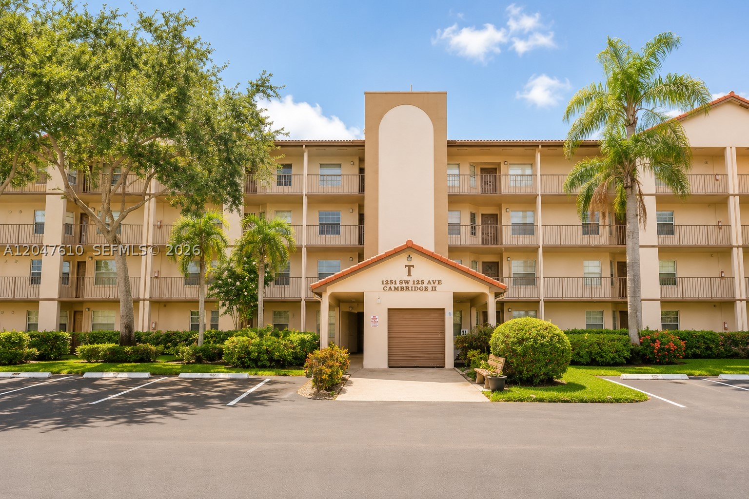 Well-proportioned 2-bedroom, 2-bath residence in Cambridge at Century Village Pembroke Pines, offering approximately 1,100 square feet, a bright interior, tile flooring, a functional kitchen, an in-unit washer and dryer, assigned parking, and a good-sized balcony overlooking mature trees and landscaped grounds. The home is comfortable as-is while still offering room for future cosmetic updates. Currently leased for $2,120 per month through May 18, 2027, providing immediate rental income to a buyer purchasing subject to the existing lease. Century Village is a gated 55+ community with an impressive collection of amenities, including clubhouse facilities, pools, fitness center, tennis, golf, community transportation, recreational activities, and security. Cable and Wi-Fi are included in the association fee.