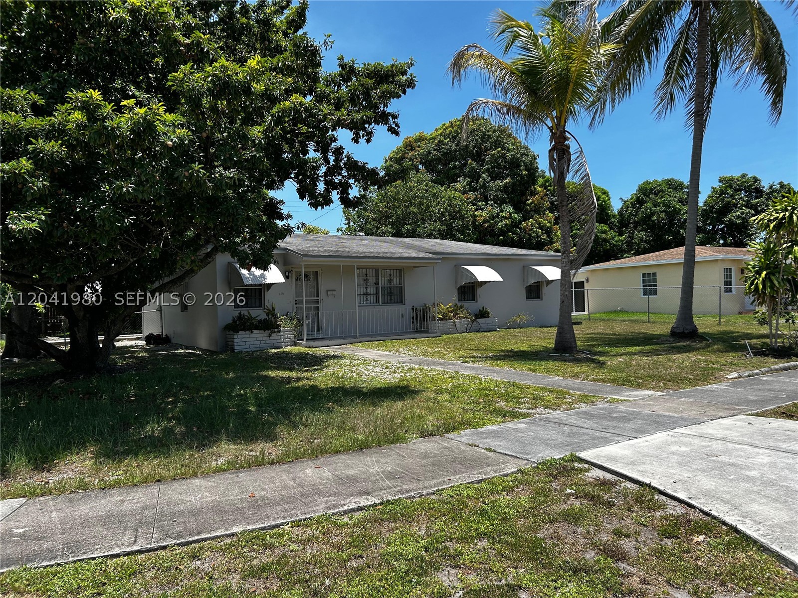 Beautifully updated corner-lot single-family home in the heart of Miami-Gardens! This spacious 4-bedroom, 2-bath residence features a bright open layout with tile flooring throughout, a modern kitchen with wood countertops, sleek white cabinetry with ample storage, and stainless-steel fixtures. The kitchen also includes a peninsula for serving or quick meals, plus a pantry. Stylish bathrooms feature gorgeous marble finishes, and a glass-enclosed walk-in shower. Washer and dryer included. Outdoor living includes a large, fenced backyard and a front porch, perfect for family gatherings, gardening, or simply relaxing. Enjoy the convenience of living near Rolling Oaks Park, Norwood Park, and the Miami Gardens Community Center, with quick access to NW 27th Ave, the Palmetto (826), I-95, and the Turnpike for an easy commute in any direction