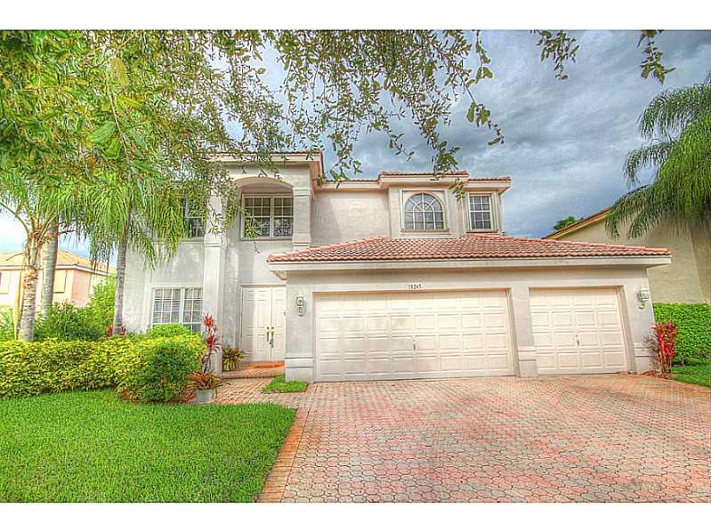 Bring MOST demanding buyers! PRESTINE conditions. Beautifully updated HUGE kitchen featuring an island, corian counter tops, & wood cabinets, huge living & family rm, large true formal dinning rm, amazing master bath & master suite with lounging area, dual huge master walk-in closets, large secondary rooms, crown molding, hurricane shutters, large screened patio, private fenced yard. Custom Draperies not included. PLEASE FOLLOW PROVIDED INSTRUCTIONS ON SHOW ASSIST. Read Broker remarks