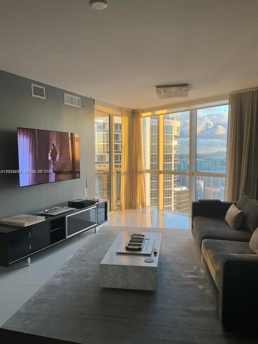 Experience luxury living in this stunning Penthouse residence at Trump Royale in Sunny Isles Beach. This beautifully finished 1-bed, 1.5-bath sky-home features sleek porcelain floors, floor-to-ceiling windows, and an open-concept layout that maximizes natural light and oceanfront elegance. The spacious living area flows seamlessly to a private balcony showcasing breathtaking panoramic views of the Atlantic Ocean, Intracoastal Waterway, and Miami skyline. 

The gourmet kitchen offers premium appliances, while the primary suite includes a spa-inspired bath and generous closet space. Enjoy world-class amenities: private beach access, oceanfront pool, spa, fitness center, tennis courts, valet, and 24/7 security. 

Located in one of Sunny Isles’ most prestigious towers, this Penthouse delivers resort-style living with unmatched views and upscale finishes perfect for those seeking sophistication in the sky.