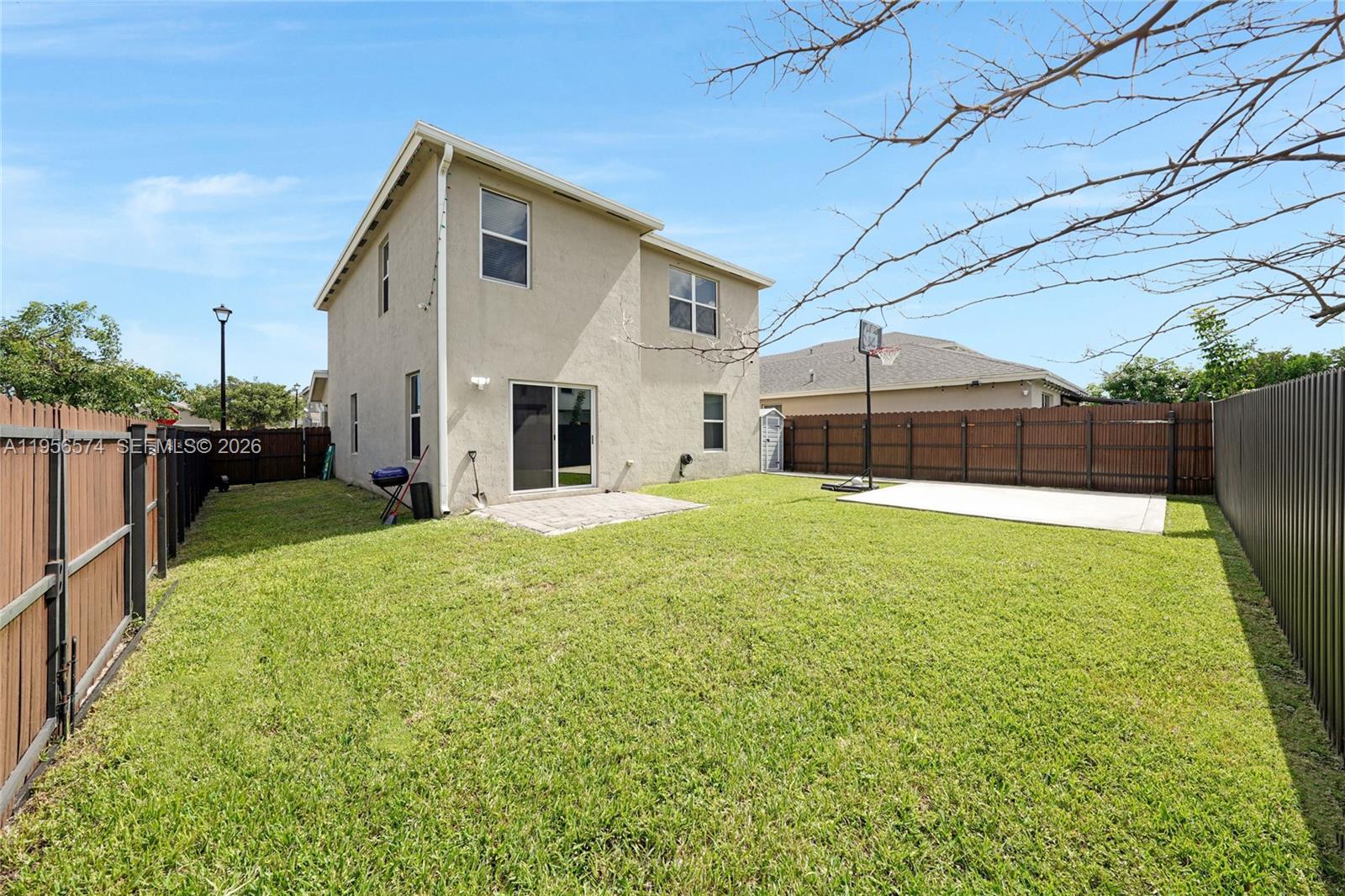 Exceptional corner home in Royal Homes West offering one of the best values in the community. This modern 4-bedroom, 3-bath residence features over 2,100 sq ft of open living space with a stylish kitchen, quartz countertops, custom built-in entertainment wall, upgraded lighting, and contemporary finishes throughout.

Tile flooring on the first floor and carpet only on stairs. Spacious bedrooms filled with natural light. Large fenced corner lot with paved area and side gate—ideal for adding a pool, RV parking, boat, or future efficiency (buyer to verify).

Built in 2020 and meticulously maintained. Low HOA only $110/month. Prime location minutes from Florida City Outlet, US-1, Turnpike, and direct access toward the Florida Keys. Move-in ready and competitively priced for today’s market. Easy to show.