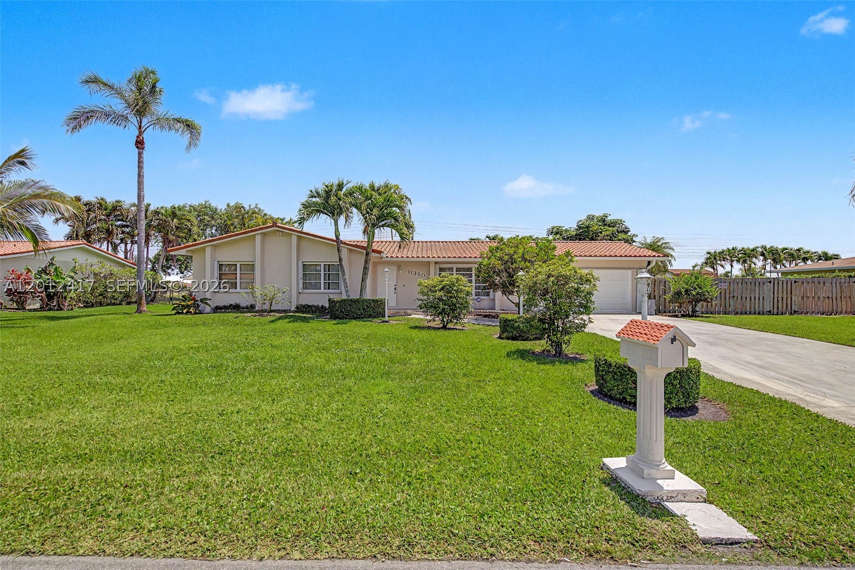 Wonderful 4 bdrm/ 3 bath canal front home in the lovely community of Pine Shores. Well-maintained with an optimal floorplan. Formal living and dining rooms. Spacious eat-in kitchen with plentiful cabinetry, gas stove, pantry and breakfast nook. Enclosed Florida room with an adjacent full bathroom, perfect for those big, extended famiy gatherings. Expansive primary suite, with large walk-in closet and bath. Indoor laundry room. Fenced backyard with patio, fruit trees and room for a pool. Plenty of space to park a boat and RV plus storage shed. Accordion & panel hurricane shutters. 2 car garage. Fantastic neighorhood!