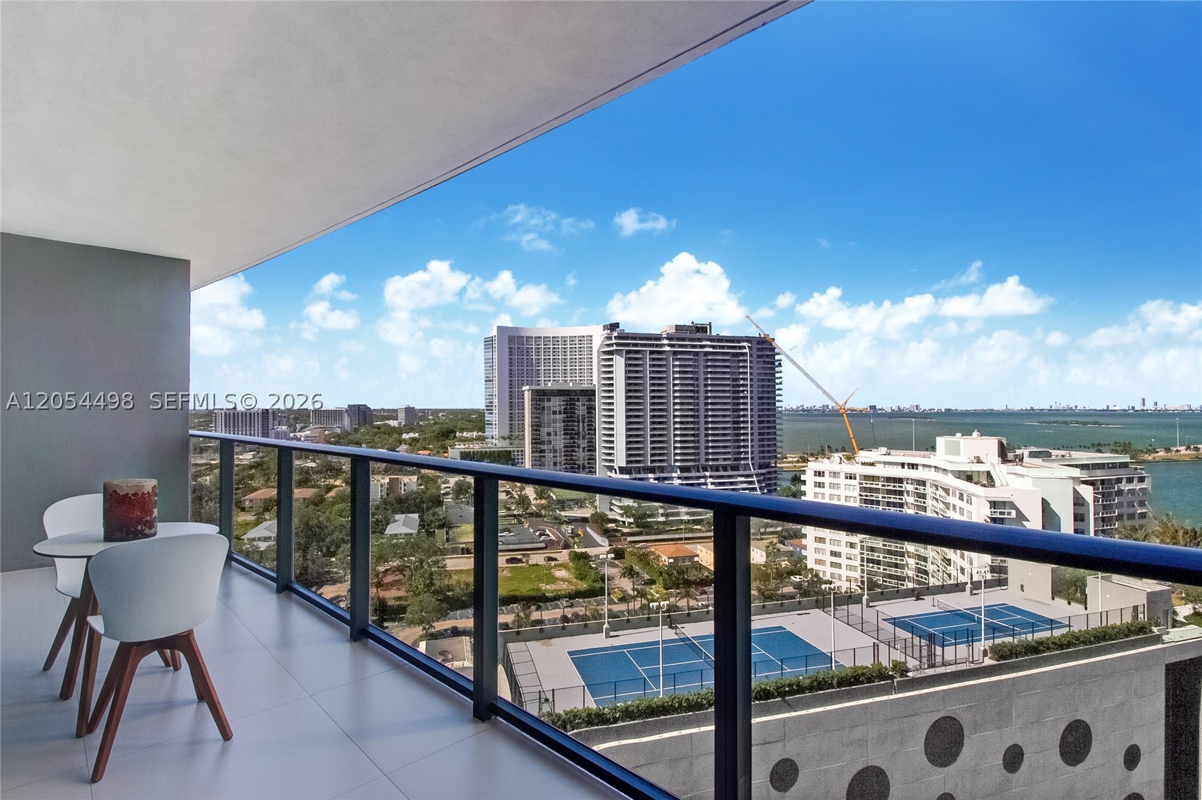 Enjoy comfortable waterfront living in this thoughtfully designed 1-bedroom, 1-bath residence at Paraiso Bayviews. This efficient layout features beautiful bay and amenity views, a spacious walk-in closet, a dual-sink primary bathroom, and a convenient guest powder room with private shower access. Residents enjoy an exceptional resort-style lifestyle with world-class amenities, including rooftop and sunset pools, tennis and paddle courts, BBQ areas, a children's playroom, billiards room, state-of-the-art fitness center, theater, spa, valet parking, and 24-hour concierge service. Tenant occupied until 04/23/2027.