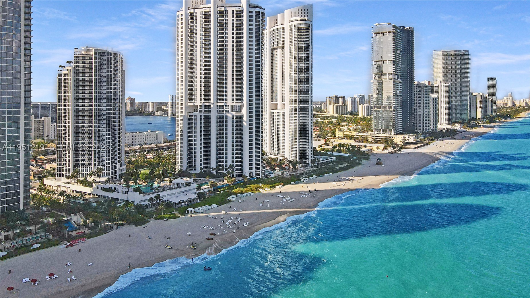 Bring your offer! Best deal at Trump International! REDUCED! Buyer opportunity, seller loss. Oceanfront condo with over 1,021 sq ft of interior space and a private balcony!  Offering sweeping views. This fully furnished unit features a complete kitchen, expansive living and dining area, elegant bathroom, in-unit washer and dryer, walk-in closet, dedicated owner’s closet with lock, and a built-in workstation—ideal for both leisure and business stays. Enjoy world-class resort-style amenities, including direct beach access with service, oceanfront dining, full-service spa, state-of-the-art fitness center, tennis courts, two resort pools, valet parking, and 24-hour security. Currently part of the hotel program, this unit generates steady income and offers flexible personal use. A premier beachfront investment in the heart of Sunny Isles Beach.