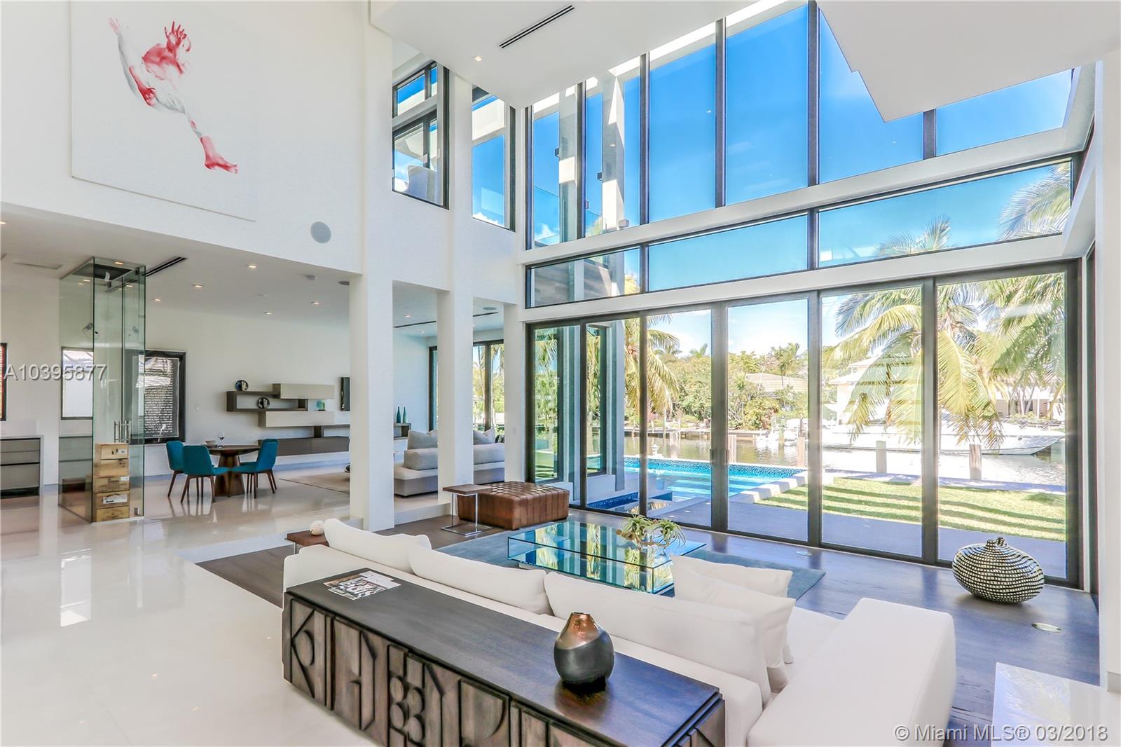 Stunning waterfront contemporary-style home in Hallandale Beach. This luxurious modern home features 6 bedrooms/5 baths, high-end finishes and top-of-the-line appliances. This 6,636 Sq. Ft. home boasts vaulted ceilings and tons of natural light throughout. Enjoy lush landscaping and gardens from over-sized terraces. Large bedrooms, open floor plan, and comfortable living spaces - both indoor and outdoor - make this the perfect home for living and entertaining. Private dock with ocean access, 2 car​​‌​​​​‌​‌​​​‌‌​​​‌‌‌​​‌​​‌‌​​​​ garage.