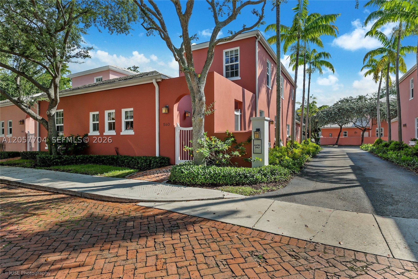 Charming Townhome within Bermuda Village in Coral Gables, built in 2007, impact hurricane windows, 10 ft. ceilings, extra large master bedroom with walk-in closet, brand new 3 A/C units, outdoor deck with IPE Brazilian wood, downstairs area recently renovated, Kitchen features quartzite countertops and Wolf/Subzero appliances, 2 car garage with plenty of space, steps away from University of Miami, Metro Rail, and the Shops at Merrick Park. 1 Bedroom downstairs with full bathroom and 2 beds upstairs each with en-suite baths. **Not seen in these pictures the master closet has been renovated***