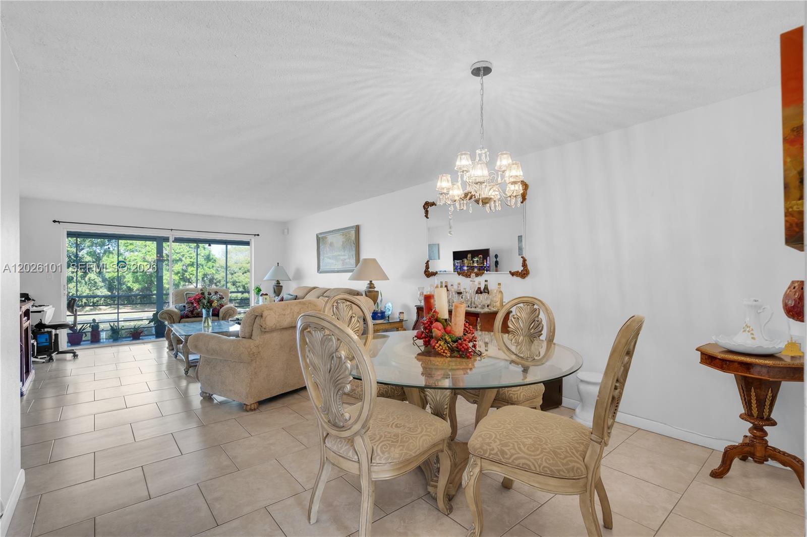 Beautiful and spacious 2-bedroom, 2-bath condo located in the highly desirable gated 55+ community of Las Vistas at Inverrary in Lauderhill. This well-maintained second-floor unit offers a bright and open floor plan with abundant natural light, tile flooring throughout the main living areas, and a large screened balcony with relaxing lake and pool views. The spacious primary suite features a walk-in closet and private bath, while the split-bedroom layout provides added privacy and comfort. Enjoy the convenience of an in-unit washer and dryer, ample storage space, and assigned parking with plenty of guest parking available.

Residents enjoy resort-style amenities including a clubhouse, fitness center, swimming pool, sauna, shuffleboard courts, walking paths, and security patrol within this beautifully maintained community. Conveniently located near shopping centers, restaurants, golf courses, medical facilities, parks, and major highways for easy commuting. Perfect for year-round living, seasonal residence, or investment opportunity. Move-in ready and easy to show. Don’t miss this opportunity to own a peaceful condo in one of Inverrary’s most sought-after communities.