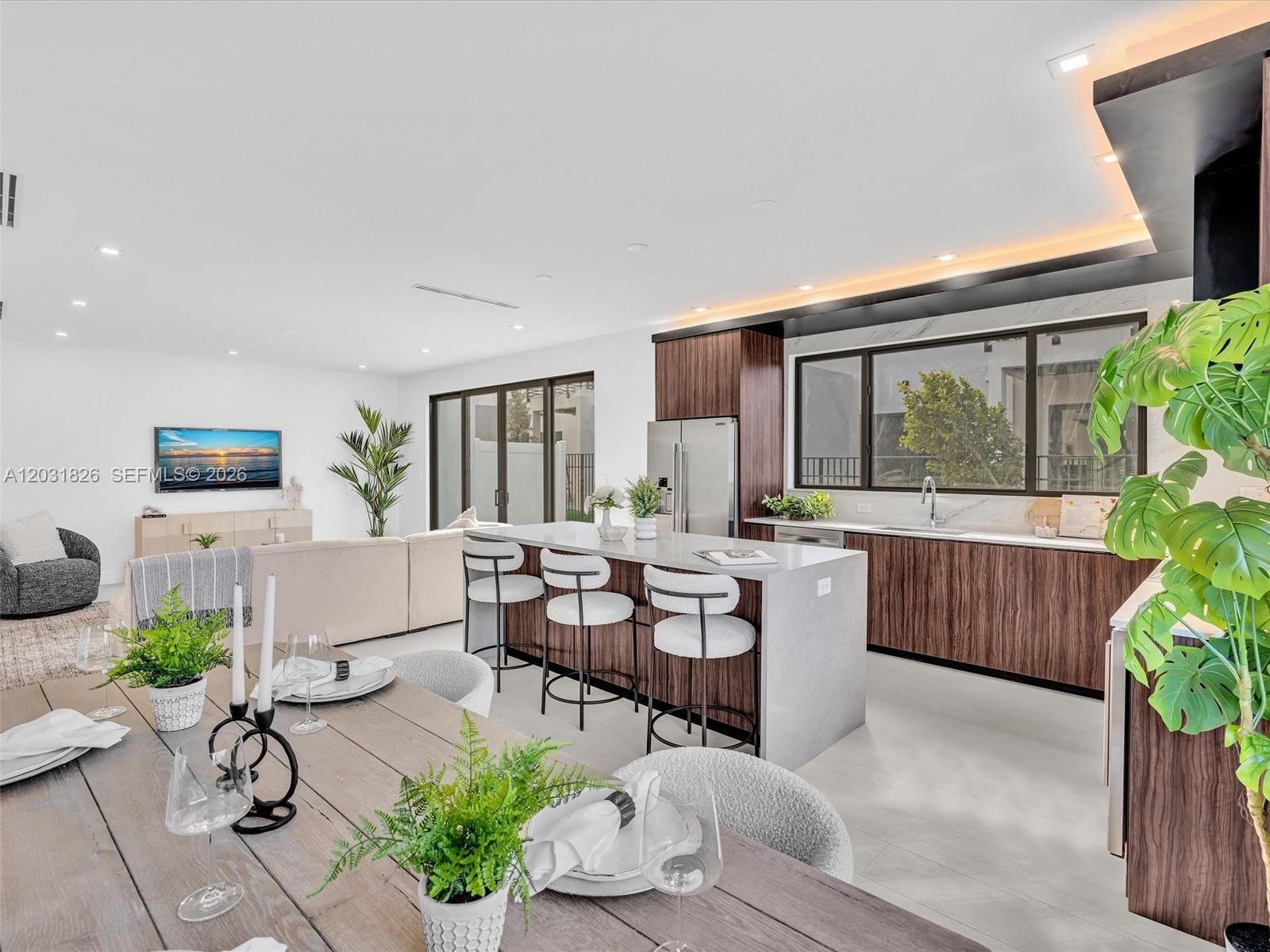 MOVE IN READY CORNER UNIT! Introducing H2O Dania, a newly delivered, gated townhome community in Dania Beach featuring just 11 modern residences with starting prices from $899,000. This boutique new construction development offers multiple layouts, contemporary architecture, and elevated finishes throughout. Four residences include deeded boat slips accommodating vessels up to approximately 32 feet, offering a rare opportunity for canal-front living. Option to customize your own plunge pool! Photos shown represent one of the available layouts. Ideally positioned minutes from Fort Lauderdale Airport, beaches, marinas, Dania Pointe, major highways, and nearby places of worship. Limited inventory! Private, in-person tours available at the on-site sales center. SCHEDULE TODAY!