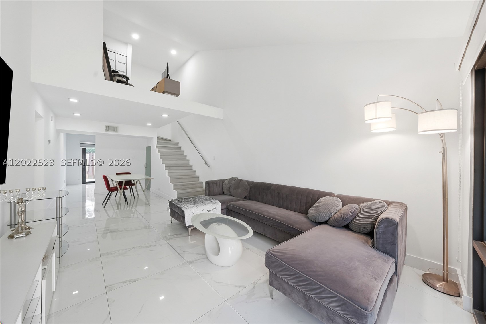 Walk in, drop your bags, and immediately feel at home. Fully renovated and move-in ready, this dual-story 4-bedroom, 2-bath townhome brings together warmth, style, and everyday comfort in a way that instantly stands out. Sunlight pours through the living spaces, highlighting the upgraded finishes, open feel, and inviting atmosphere that makes this home as functional as it is beautiful. Picture slow weekend mornings with coffee, dinners filled with friends and family, and the flexibility of extra space for a home office, gym, playroom, or guest retreat. Every space was designed to feel easy to live in and ready for the next chapter. Set in an incredibly central Miami location near major highways, shopping, dining, parks, and everything South Florida has to offer, this is more than a turnkey home. It is an opportunity to step into a lifestyle that already feels complete.