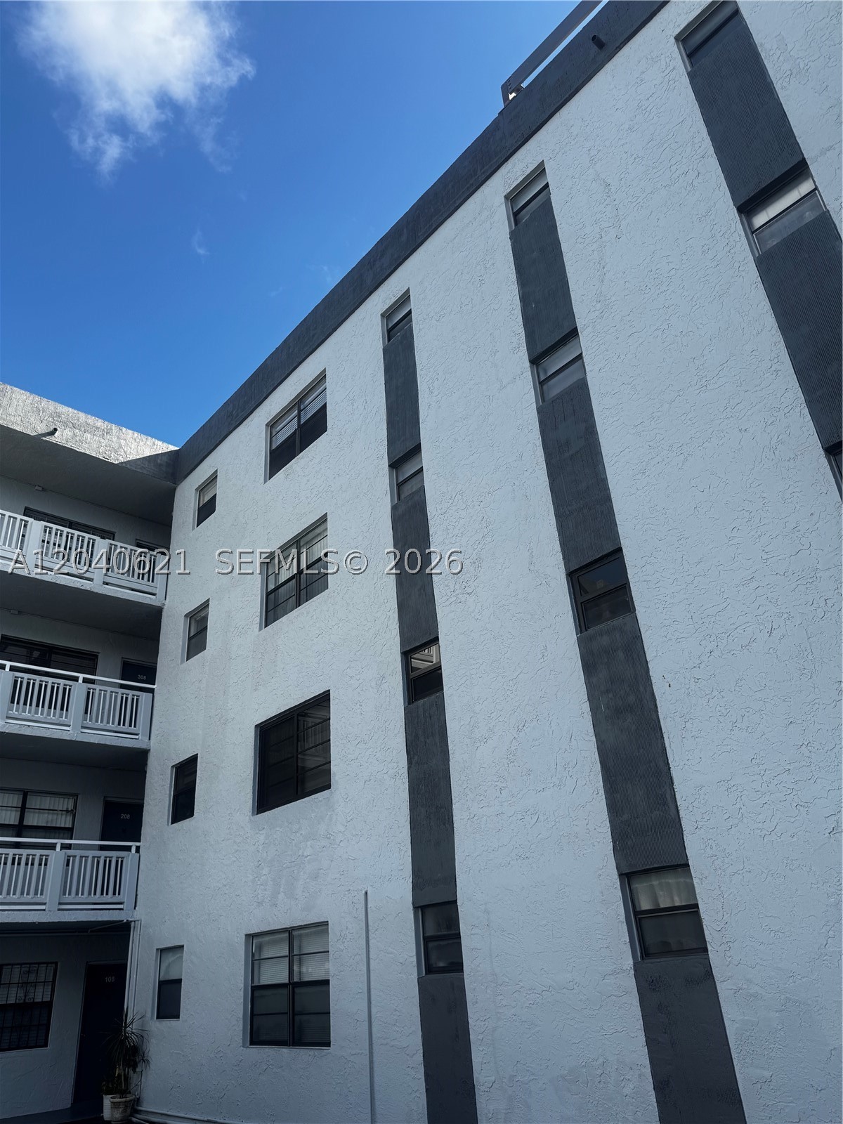 Beautifully maintained condominium in the desirable Brookview community. This bright and spacious residence features an open living and dining area, abundant natural light, and a functional floor plan designed for comfortable living. The kitchen offers ample cabinet space and overlooks the main living area, making it ideal for everyday living and entertaining. The generously sized primary suite includes a large closet and private bath. Enjoy the convenience of assigned parking, elevator access, and community amenities including a pool and well-maintained grounds.

Ideally located near major highways, shopping, dining, beaches, and public transportation, this property offers exceptional value for both owner-occupants and those seeking a seasonal residence. Low-maintenance living in a centrally located North Miami community.