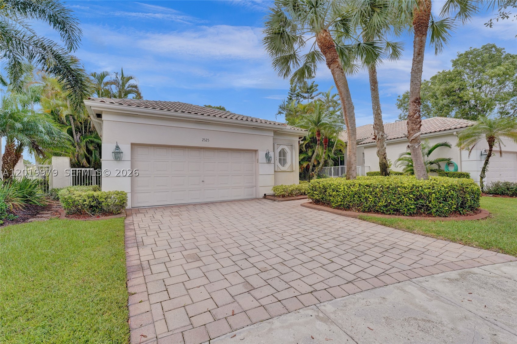 Bay pointe Tucked away on a quiet cul-de-sac in the prestigious Weston Hills Country Club community of Bay Pointe, this beautifully maintained one-story residence offers 3 bedrooms and 3 bathrooms with a spacious, functional layout. Inside, soaring ceilings, neutral diagonal tile flooring, and abundant natural light create an inviting atmosphere, while serene lake views set the backdrop from the screened paver patio.
The kitchen features white cabinetry, granite countertops, and a sunny breakfast nook overlooking the outdoor living spaces. Designed with a desirable split-bedroom floor plan, each bedroom offers generous space and privacy. The oversized primary suite includes a luxurious bath with a Roman tub, separate shower, and dual sinks. Additional highlights include a 2021 A/C system, high-impact front door, and freshly painted interior.
Enjoy easy, maintenance-free living with HOA-covered landscaping, sprinkler maintenance, exterior house painting, and pressure cleaning.