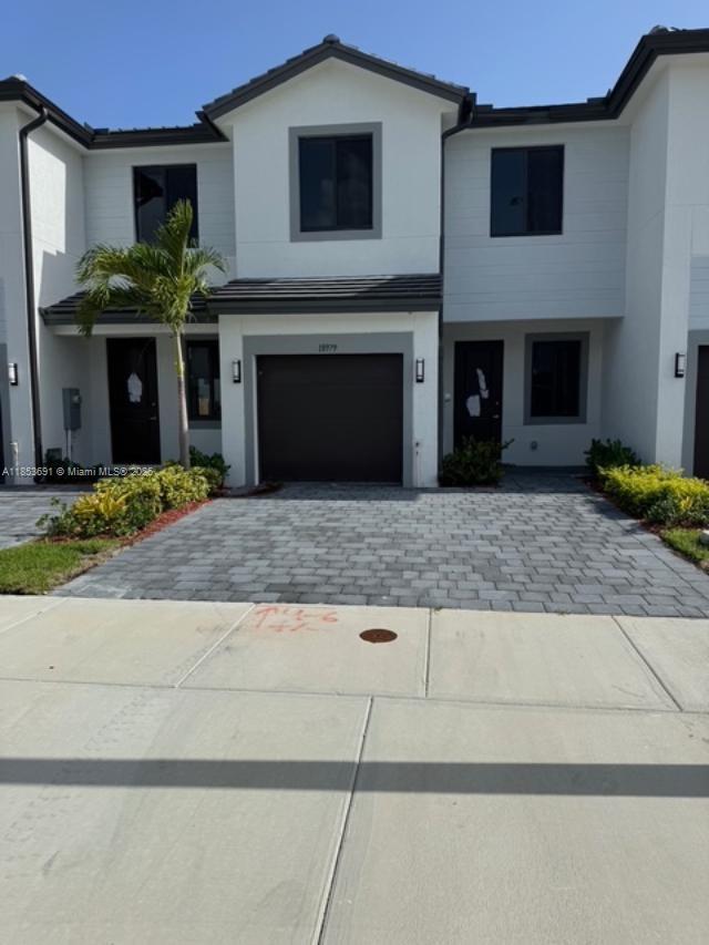 READY TO CLOSE, BEAUTIFUL TOWNHOUSE, 3 BEDROOMS AND 2.5 BATHROOMS WITH ONE CAR GARAGE ALL TILED-ON 1ST FLOOR, LAMINATED FLOOR UPSTAIRS, IMPACT DOORS AND WINDOWS, FHA APPROVED, EASY TO SHOW.