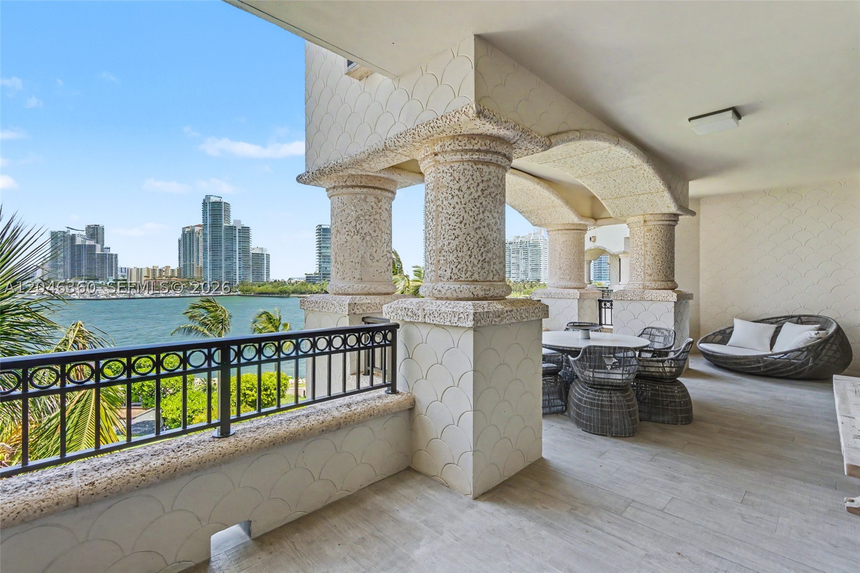 This elegant and modern unit in Palazzo Del Sol is stunning with 5-Star amenities. The beautiful 3,793 SF unit features 3BR/3+1BA and boasts, 2 large terraces: w/open views to Government cut, and Miami Beach, views over Fisher Island. Open living/dining room layout, large family room, tan oak floors, custom wallpaper, wood and Calacatta Marble accented walls. Eat-in gourmet kitchen sports top of the line Gaggenau and Sub-Zero appliances, granite counter tops/backsplash. The private master suite offers direct terrace access and water views, separate his/her walk-in closets and all 3 bathrooms have beautiful Carrara Marble, master bath with walk-in glass-marble rain shower and oval tub. Other 2 BRs with en-suite bathrooms and shared terrace w/views of Fisher Island. Residents enjoy an unparalleled lifestyle with world-class amenities, including the exclusive Aperitivo Coffee Bar, offering complimentary breakfast, daytime light bites, and evening aperitivo while overlooking the yachts and the iconic Government Cut. These exceptional dining offerings are included as part of the maintenance fees, providing an effortless resort-style living experience.
