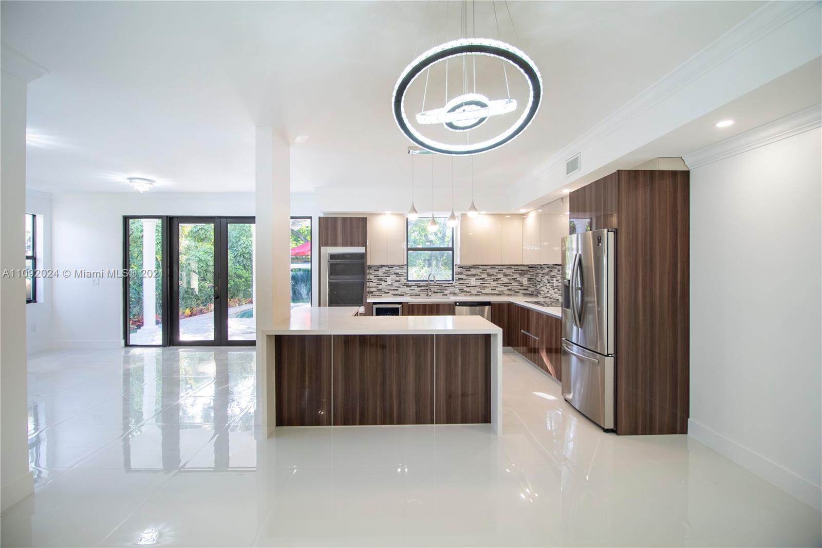 Back on the market! Buyer financing fell apart, their loss is your opportunity! Stunning COCONUT GROVE Home! GORGEOUS home features 5 bedrooms, 4 bathrooms, 2510sf of living space.  Construction area 3,225 SF. The first floor features FULL BEDROOM & BATHROOM, BRAND NEW OPEN KITCHEN, NEW POOL AREA, connected to a covered open terrace w/Outdoor kitchen ( BBQ and sink) Attached one Garage, FULLY REMODELED BATHROOMS, and amazing laundry room w janitor sink. This home also boasts TWO balconies on the second floor. And balcony overlooking the pool area.
Located near a central street, in the highly-coveted Coconut Grove/Coral Gables area, this home is minutes away from most of what Miami has to offer –Call today to schedule an appointment to come see your Miami Dream Home!