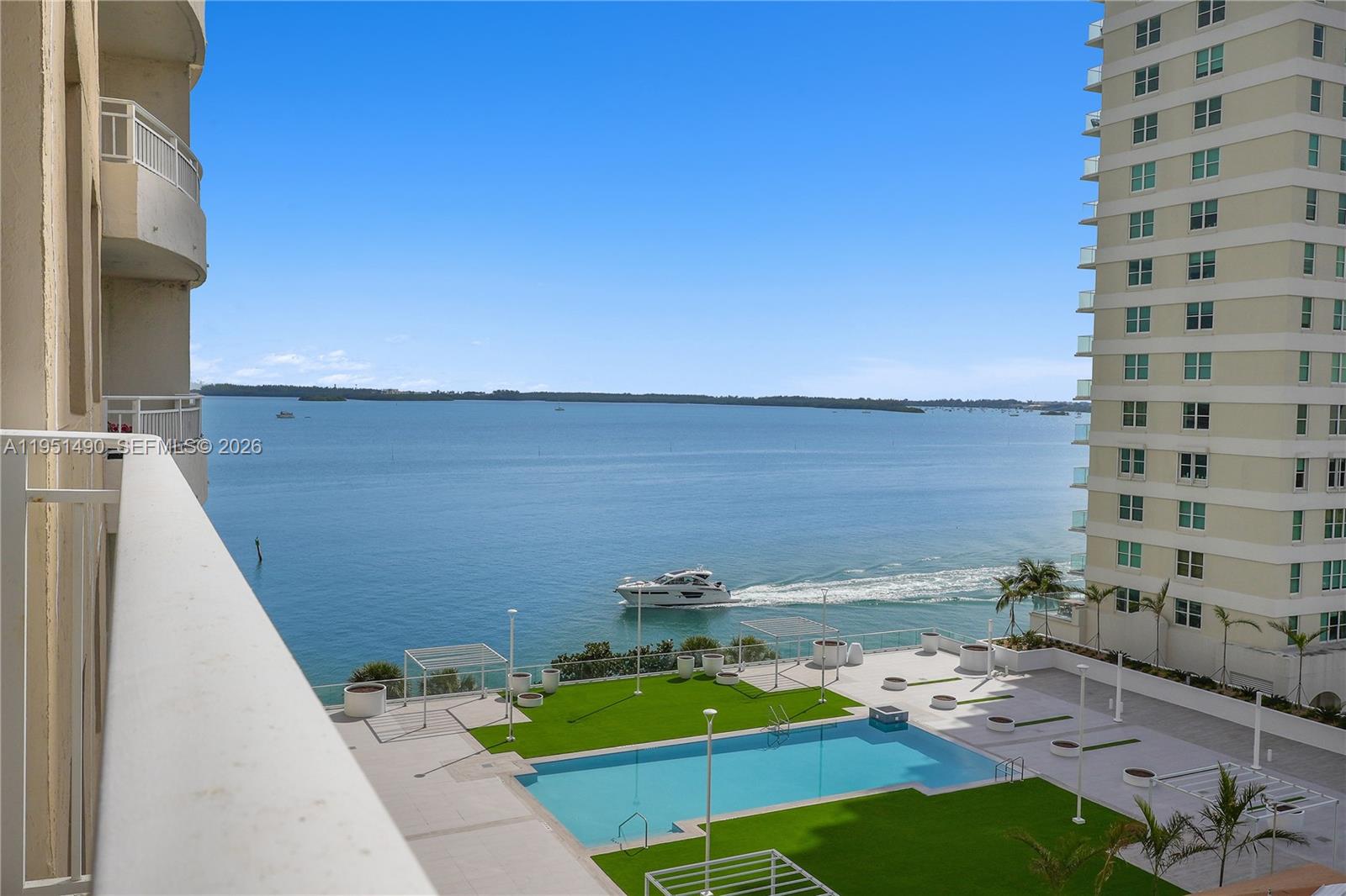 Move to exclusive Brickell Key! Bright and spacious 1-bedroom, 1-bath unit featuring a private balcony with stunning views of Biscayne Bay and Isola’s new pool deck. Marble floors throughout, tile in kitchen and bath, granite countertops, in-unit washer/dryer, brand-new A/C, and one assigned covered parking space included. Second parking space available. Full-service building with valet, 24-hour concierge, bay front gym, tennis courts, business center, club room, and on-site management. Enjoy relaxed island living, walking distance from Brickell City Centre’s dining, shopping, and entertainment! 2 Two parking spaces included in lease ( rental value 1 PS=$170)