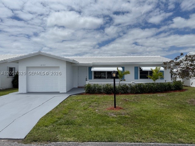 Beautifully updated single family home in Boynton Beach’s premier 55+ community in Palm Beach county. This 2BD/2BTH home features a family room, one-car garage and enclosed back porch. Master Bath has a walk-in shower with a waterfall design. A brand new roof was just installed and the house has been remodeled inside with new porcelain flooring throughout, new bathrooms and new kitchen cabinets with granite countertops. Just painted inside and out, with a new entry door and freshly painted driveway. A light filled and airy home featuring recessed lighting throughout. The house is within walking distance of the club house, in a pleasant and well-managed community with low HOA fees ($240/month) that includes clubhouse, heated pool, exercise room, library, game room, bocci ball courts, billiards, golf, cable, internet, lawn maintenance, etc., and plenty of daily activities! Easy access to nature preserves like the Green Cay Nature Center and nearby I-95, and a short drive to both West Palm Beach and Delray Beach.

Home recently appraised for $335,000.
