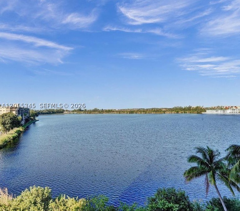 Extra-large 1-bedroom condo with a beautiful [water] view in North Miami Beach! Oversized layout, tons of natural light, [private balcony + updated finishes], and great building amenities — minutes to the beach and Aventura. Rarely available at this size.  — schedule your showing today!