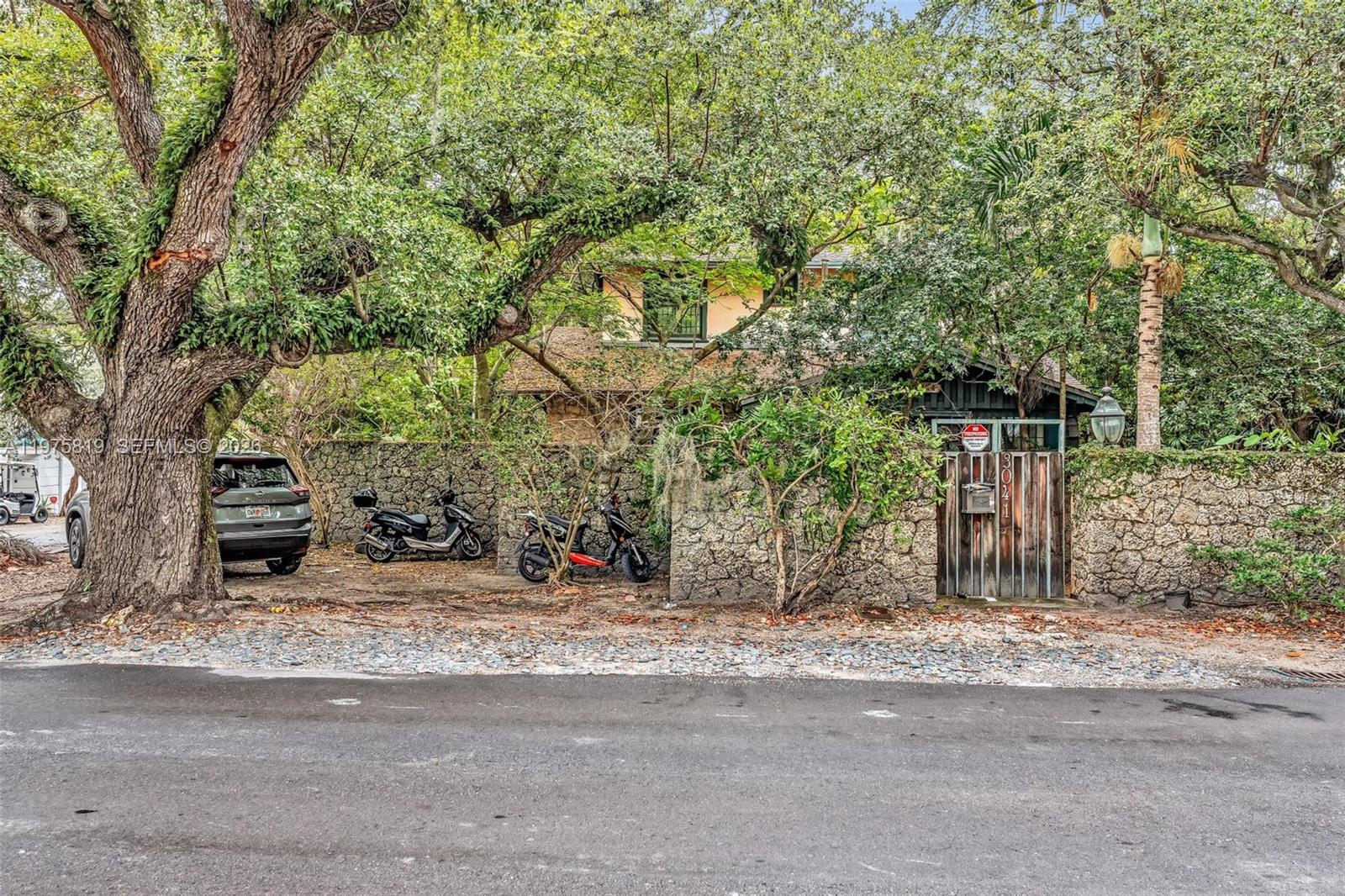 Charming 1921 two-story home in the heart of Coconut Grove. This 4-bedroom, 2-bath residence offers 2,056 total sq ft (1,896 adjusted) on a spacious 7,800 sq ft lot. Filled with historic character and natural light, the home features comfortable living areas and ample outdoor space with room for a pool. Prime location near parks, marinas, dining, and top schools.
