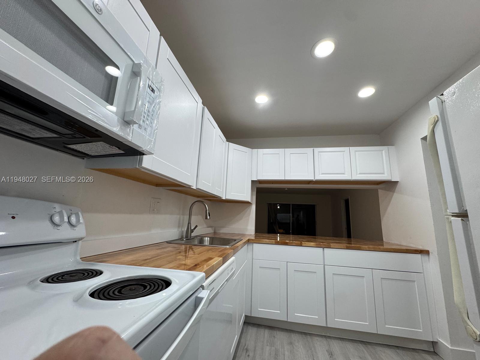 VERSAILLES GARDENS CONDO - Residential