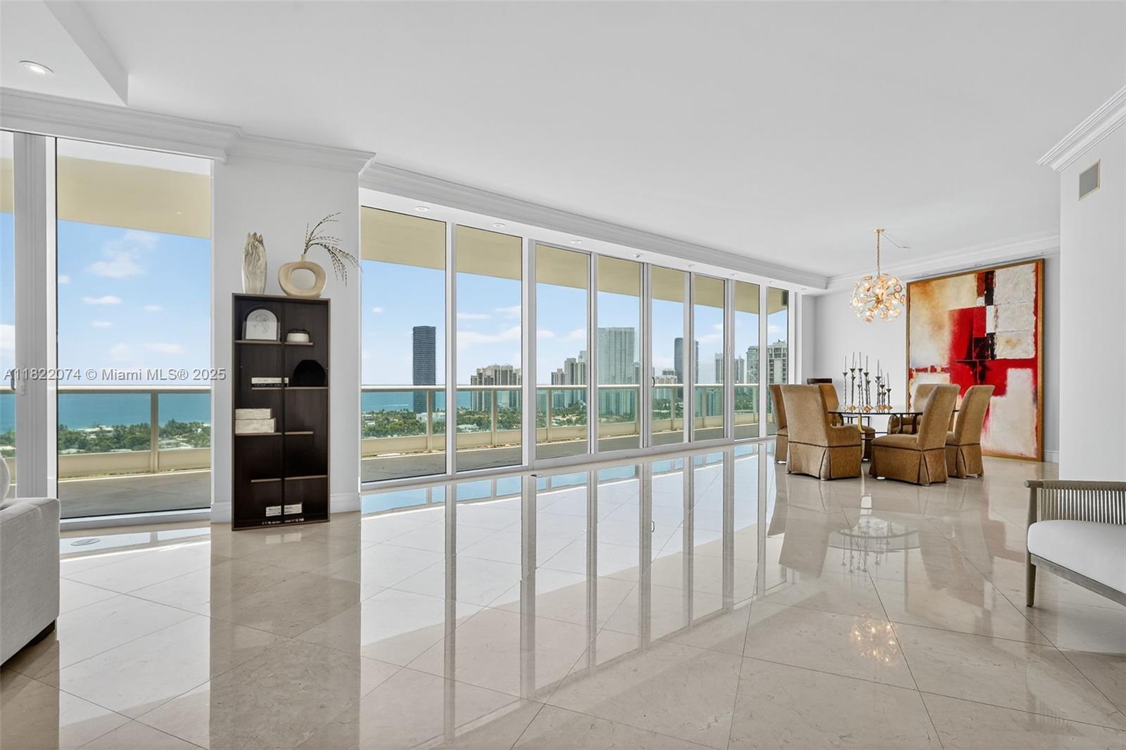 ENTER AVENTURA'S MOST PRESTIGIOUS ADDRESS "PORTO VITA" TO PRIVATE ELEVATOR FOYER AND BE WOWED BY THIS RARELY SEEN 5,141 SQFT RESIDENCE. IMMEDIATELY + THROUGHOUT SEE THE BEST VIEWS IN TOWN OF THE DIRECT OCEAN OVER GOLDEN BEACH + INTERCOSTAL ON THE EAST AND FABULOUS RENOWNED TURNBERRY ISLE GOLF COURSE TO THE WEST FROM SPACIOUS FLOW THROUGH FLOOR PLAN. BEING SOLD FULLY TURNKEY + DECORATED WITH THE FINEST FURNISHINGS. 4 BEDROOM EN SUITES, OVERSIZED MASTER SUITE WITH 2 FULL BATHS-FACING OCEAN + HOUSEKEEPER QUARTERS + DEN + HUGE LIVING/DINING KITCHEN AREAS + LARGE LAUNDRY ROOM + 6.5 BATHROOMS. SPACIOUS WRAPAROUND TERRACES ON TWO SIDES. A GEM!