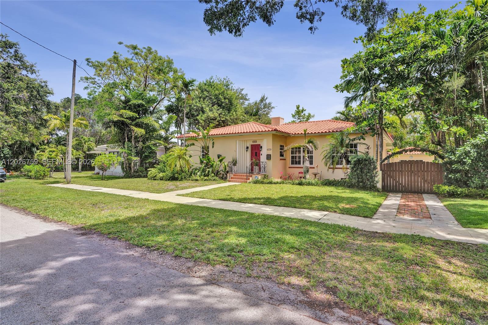 Located on an oversized 10,780 SF lot in desirable Miami Shores, this charming pool home features a 2BR/1BA main house plus a detached guest house. The spacious 2,000 SF main home offers a recently renovated oversized kitchen with modern finishes, generous counter space, and seamless flow into the living area and screened patio. Additional highlights include two large bedrooms, an updated bathroom, hurricane windows, original wood floors, and a bright sunroom with French doors opening to your private tropical backyard and heated pool.

The stunning Mexican casita-style guest house provides exceptional flexibility for guests, extended family, a home office, or rental income potential. This can be entered through the screened patio from the main house, or separately up the driveway. The expansive backyard offers endless possibilities to create your dream outdoor retreat.

Ideally located within walking distance to top-rated schools, downtown Miami Shores shops, restaurants, and cafés. A beautiful move in ready home as-is, or plenty of room to expand and personalize. This property offers outstanding flexibility, value, and opportunity. A rare offering at this price point in Miami Shores.
Showings start Monday June 1st.