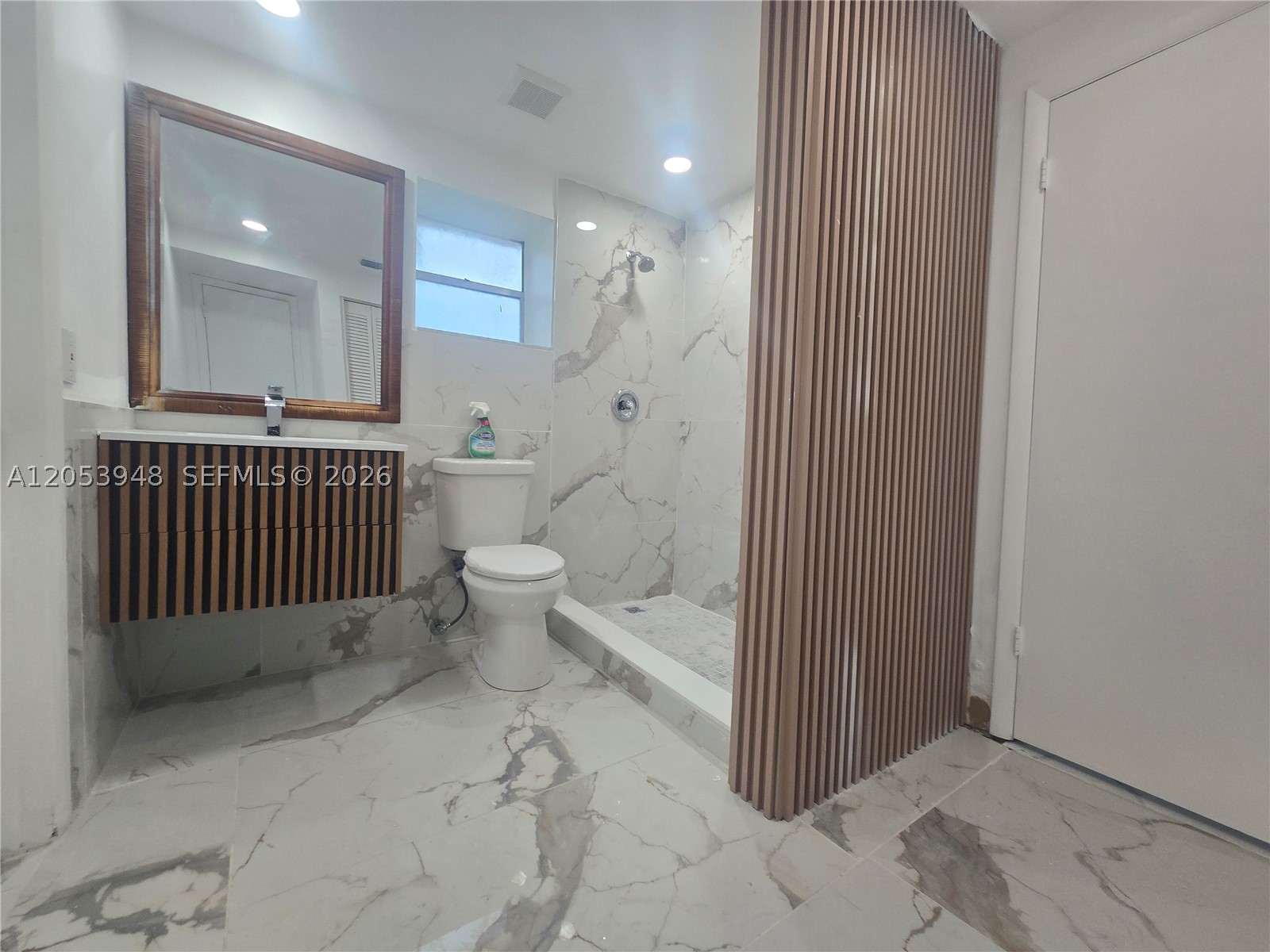 Excellent location, close to all facilities and easy access to Palmetto expressway, featuring spacious open area and abundant natural light, with a large open balcony , brand new tile floor all around, remodeled bathroom with shower and also 1/2 bathroom remodeled . HOA association fee affordable, Plenty of visitor parking .  This area have great demand for rental with make this unit very desirable for rental and attractive for investors. Call listing agent now to scheduled a showing.