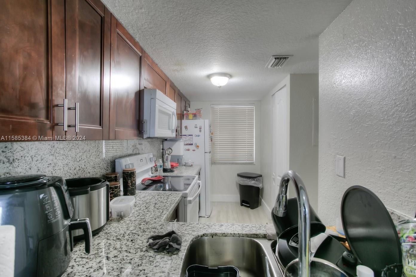VISTA DEL LAGO I CONDO - Residential
