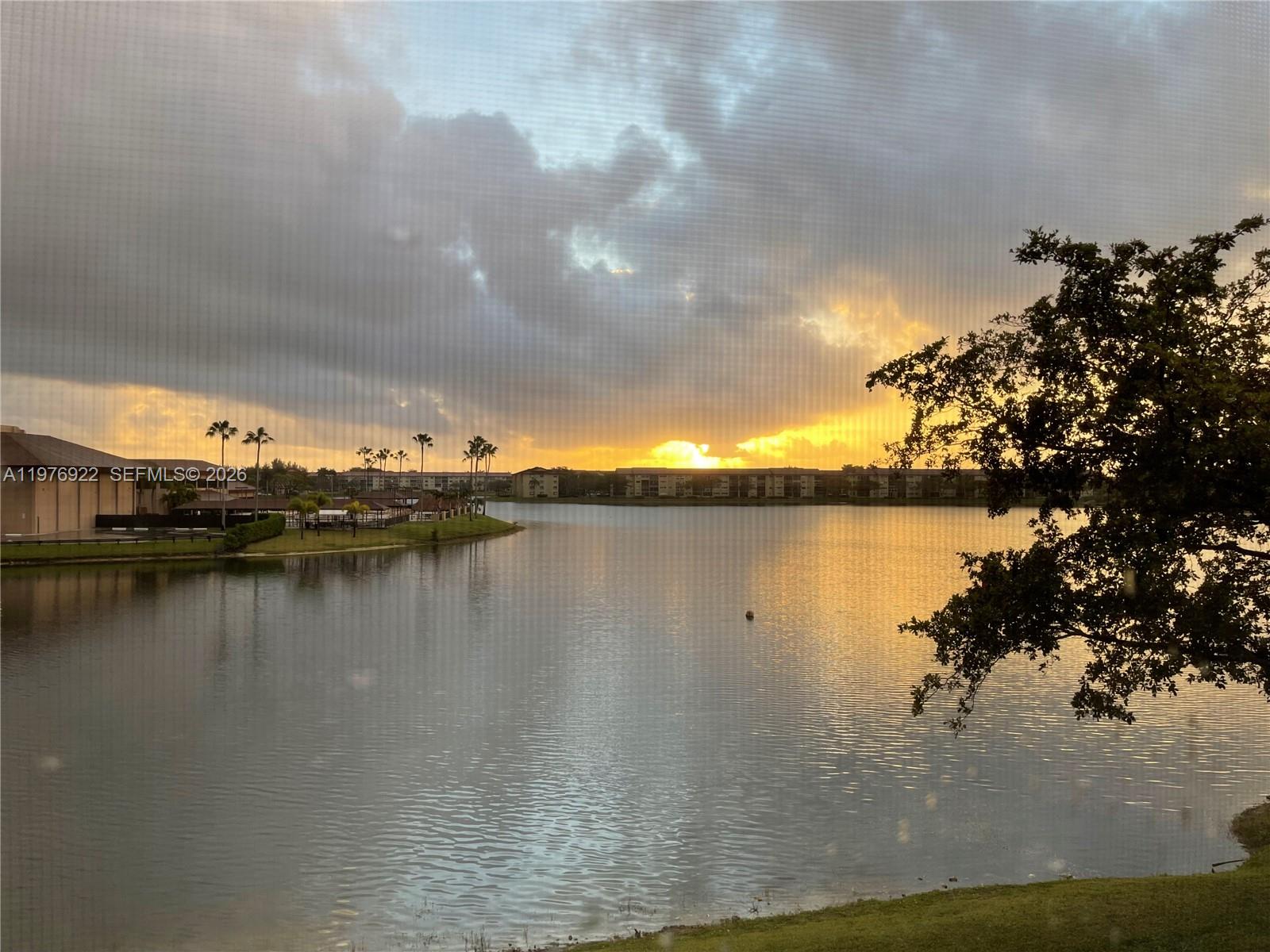 Welcome to your Lake Front 1 bedroom 1 and a half bath unit. Enjoy spectacular sunrises right from your own balcony. Imagine your morning cup of coffee or favorite drink, overlooking the beautiful Lake View, as you enjoy the first morning light.  The bedroom features a double glass sliding door that faces the lake. This unit is all about location. The building has elevator, a private parking space and plenty of guess parking. The complex is a gated community and offers many activities including clubhouse, pool, fitness center, transportation, and is minutes from shopping centers.