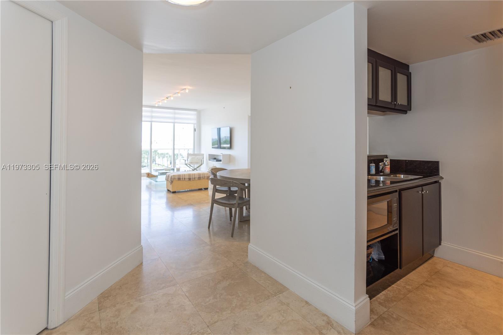 Enjoy ocean views from this beautiful condo. Large kitchen with Sub-Zero appliances & granite countertops, plus a generously sized Master bedroom Near shopping and restaurants. The amenities at the Solimar include: 24-hour security, valet, beach & pool service, gym, sauna/steam room & business center