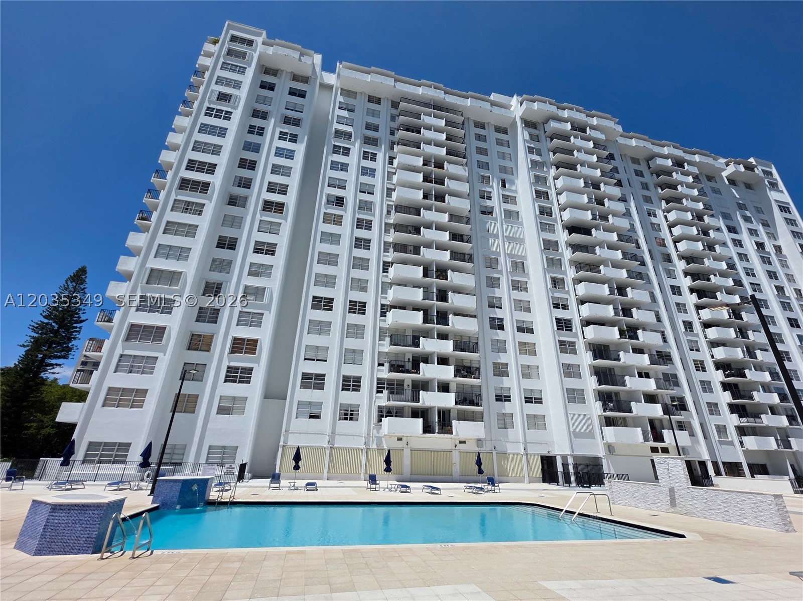 Incredible value in the heart of Aventura! This high-floor, oversized 1-bedroom, 1.5-bathroom residence at Commodore Plaza offers an impressive 887 square feet of living space. Located on the 11th floor, the unit features a spacious and functional layout filled with natural light, waiting for your personal touches. Commodore Plaza provides a secure, gated environment with top-tier, resort-style amenities including two swimming pools, tennis courts, a fully equipped gym, billiard rooms, and even exclusive boat docks available for residents. Enjoy total peace of mind with 24/7 lobby concierge, security staff, and assigned parking. The building maintains a quiet, stable community lifestyle by strictly prohibiting short-term rentals and maintaining a pet-free policy. Perfect for buyers seeking maximum space, tranquility, and value in a prime location close to world-class shopping, dining, and beaches.