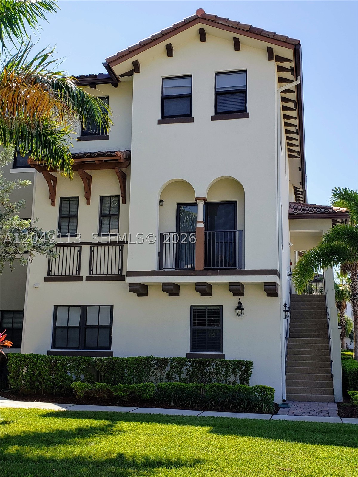 Discover this beautiful two-story condo in the highly desirable gated community of Adagio at Central Park, Doral. This 3B/2.5B apartment features tile flooring throughout the first floor, cozy carpet upstairs, and a beautiful kitchen with granite countertops and stainless-steel appliances. Enjoy an open balcony and the peace of mind of a secure, guard-gated community. Residents have access to the spectacular Grand Bay Clubhouse, offering resort-style amenities including a state-of-the-art fitness center, pool, spa, sauna, tennis and basketball courts, soccer field, playground, kids' water park, and BBQ areas. Conveniently located near top-rated A+ schools, major highways, shopping, dining, parks, and walking trails. This is the perfect place to call home!