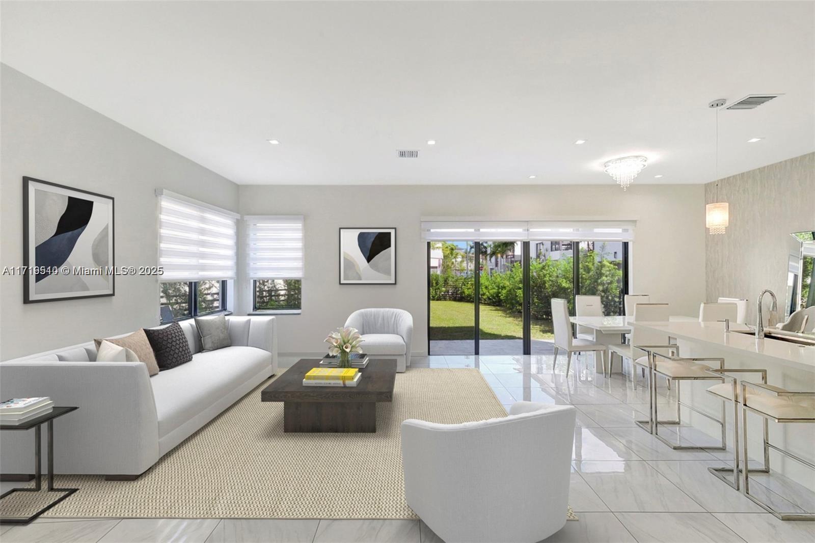 Welcome to your dream home in Canarias at Downtown Doral! This stunning 4-bedroom, 3.5-bathroom residence is one of the few homes ideally situated on a prime corner lot, offering modern elegance and spacious living full of upgrades. Step inside to discover a bright, open-concept layout featuring high-end finishes and a fully functional gourmet kitchen with quartz countertops. Enjoy the convenience of a private outdoor space designed for both relaxation and entertainment. Experience resort-style living with a state-of-the-art clubhouse! This prime location is within walking distance to amazing parks, a variety of restaurants, bars, shops, and grocery stores. Plus, you'll have access to top schools. Embrace a vibrant lifestyle where convenience meets luxury!