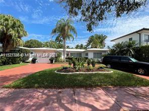 Lowest price home in Normandy Shores. Excellent Condition. Brand new kitchen, brand new lush landscaping, trees, and irrigation, brand new white fans, brand new deck and outdoor walkway. Very Easy to Show!
