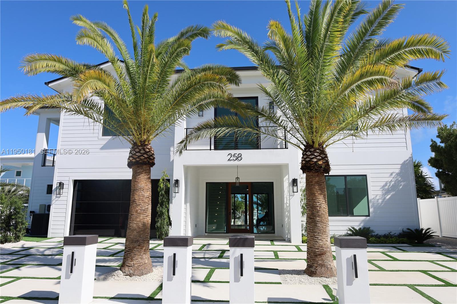 Pictures are coming soon.The picture is a Rendering image.Brand-new waterfront construction featuring 6 bedrooms and 7.5 bathrooms with a modern open-concept design. This residence offers high-quality finishes throughout, including a chef's kitchen with premium Sub-Zero appliances. Built with efficiency and durability in mind, the home includes a metal roof, solar panels, and a water cistern system. Outdoor amenities include a resort-style pool, expansive covered entertaining areas, a 65-foot dock, and a tackle room--ideal for boating and waterfront living. A rare opportunity to own a luxury new construction combining modern design, high-end materials, and eco-conscious features.