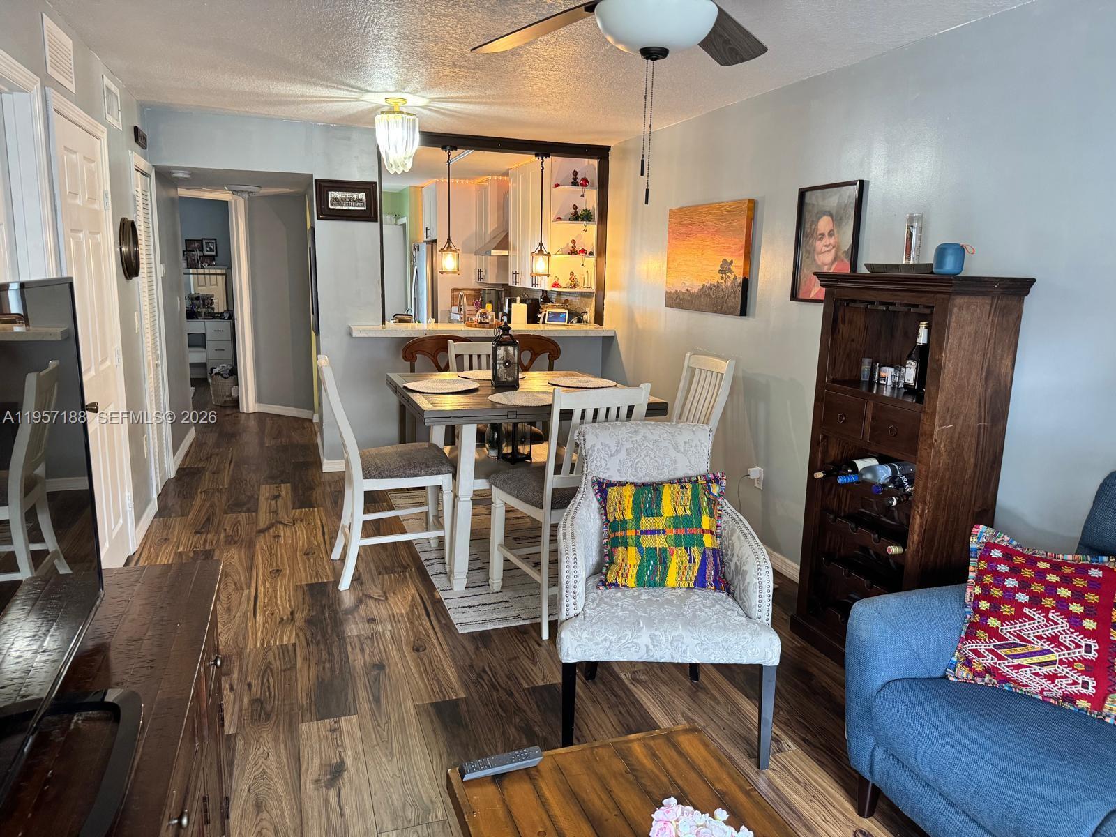 Wake up to peaceful lakefront views in this completely remodeled first-floor unit located in sought-after Venetia Gardens South. Every detail has been thoughtfully updated, including new flooring, a stunning modern kitchen, renovated bathrooms, and custom-designed closets. The kitchen is a standout, featuring stainless steel appliances, a stainless steel hood, double oven, ample pantry space, and custom shelving—perfect for cooking, hosting, and everyday living. The spacious primary bedroom offers a walk-in closet with built-in shelving for effortless organization. Enjoy the convenience of first-floor living paired with serene water views right outside your door. Residents have access to a community pool, ideal for relaxing and enjoying South Florida living. Perfectly located near US-1 and the Florida Turnpike, with easy access to daily commutes and just 20–30 minutes from the Florida Keys. A brand-new Publix sits at the entrance of the community, with shopping, dining, and essentials just moments away. Storage unit included. A rare opportunity to enjoy stylish lakefront living in a prime location.